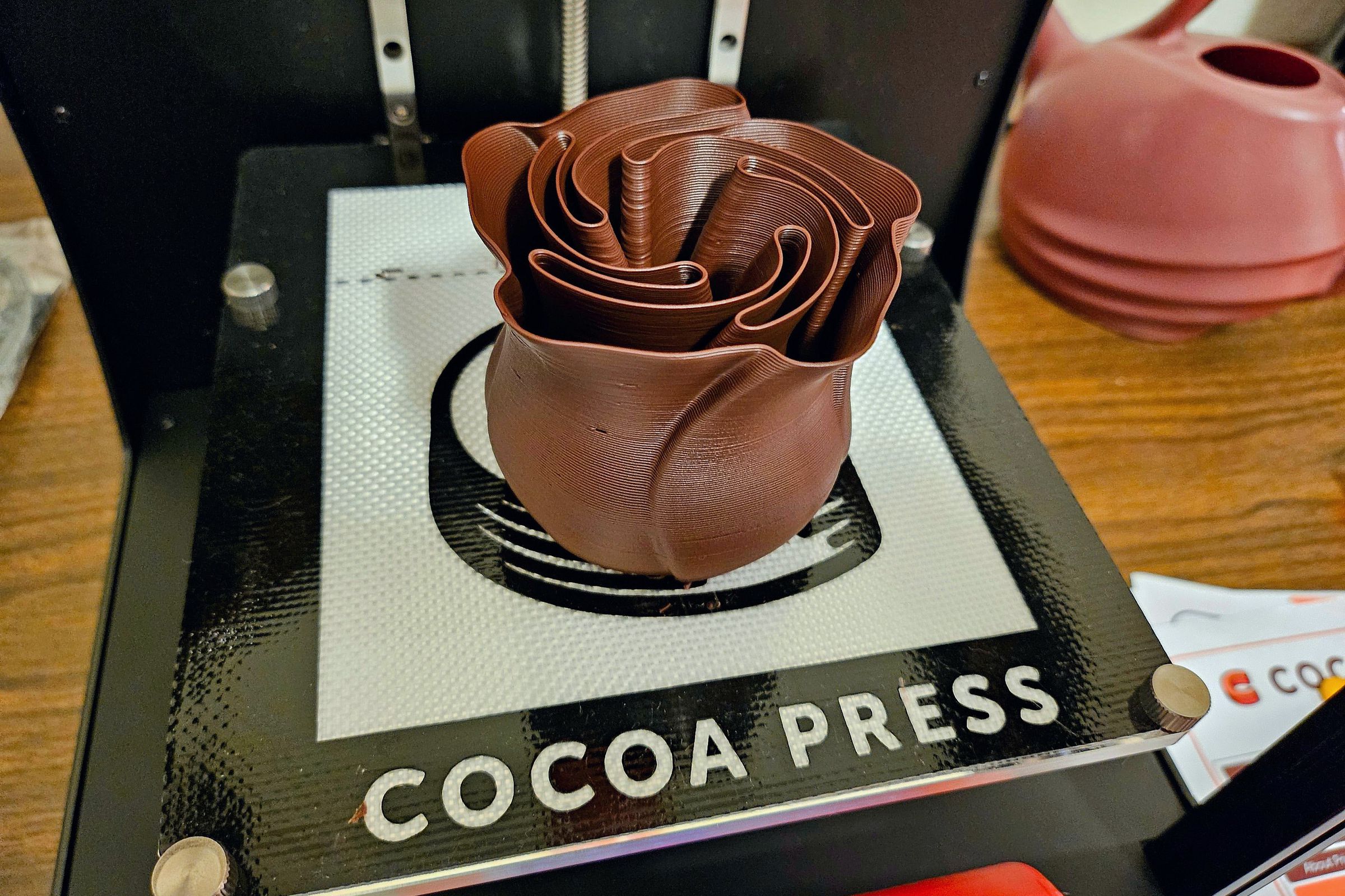 A chocolate rose vase printed on the Cocoa Press.