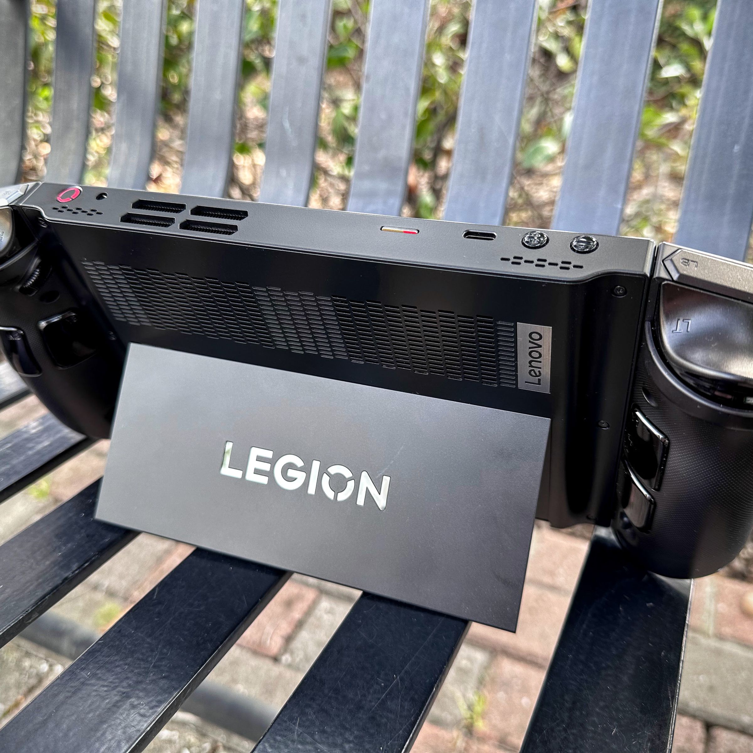 The Lenovo Legion Go, with its controllers attached and its kickstand unfolded.