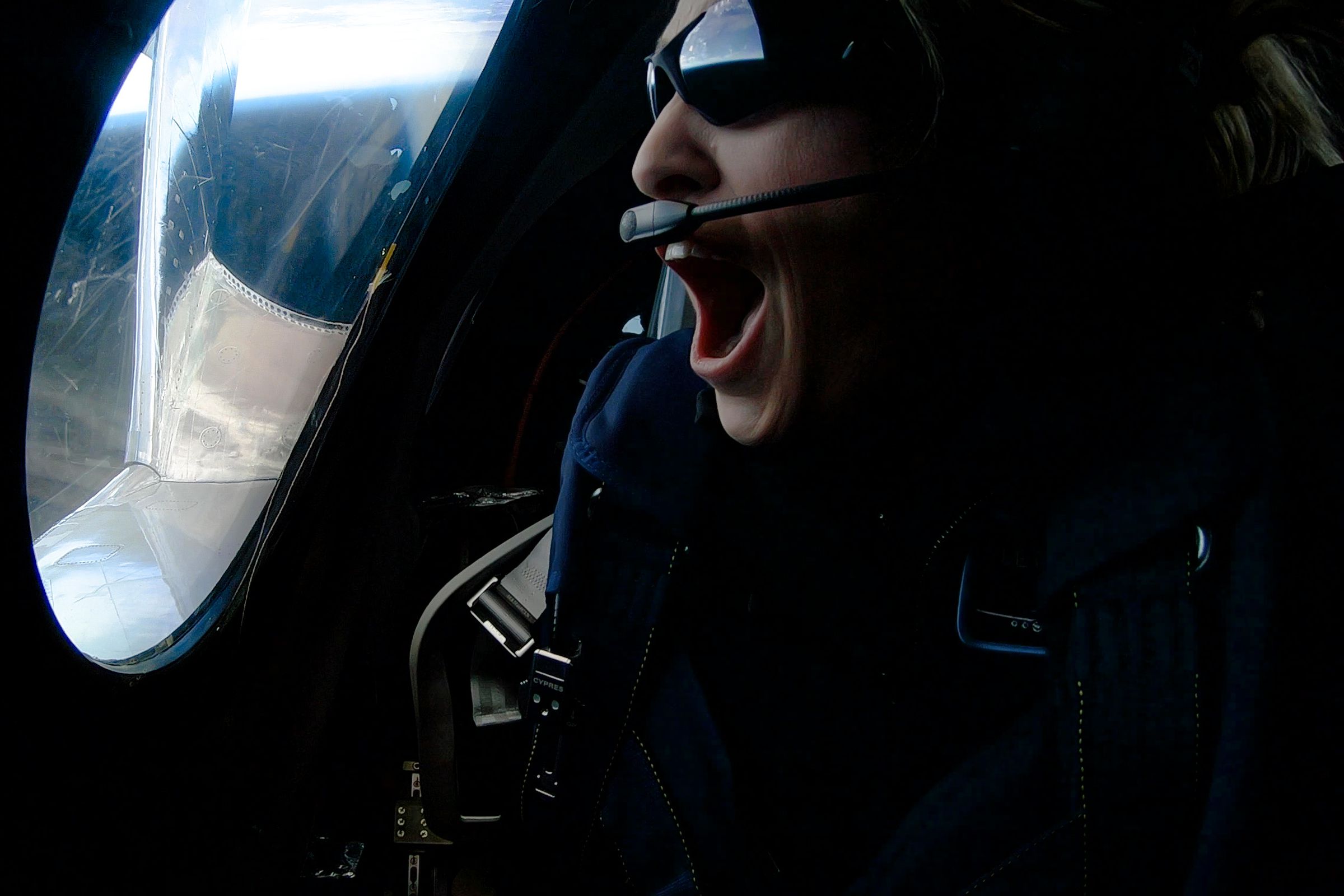 Virgin Galactic’s astronaut instructor, Beth Moses, looks out the window during her first test flight