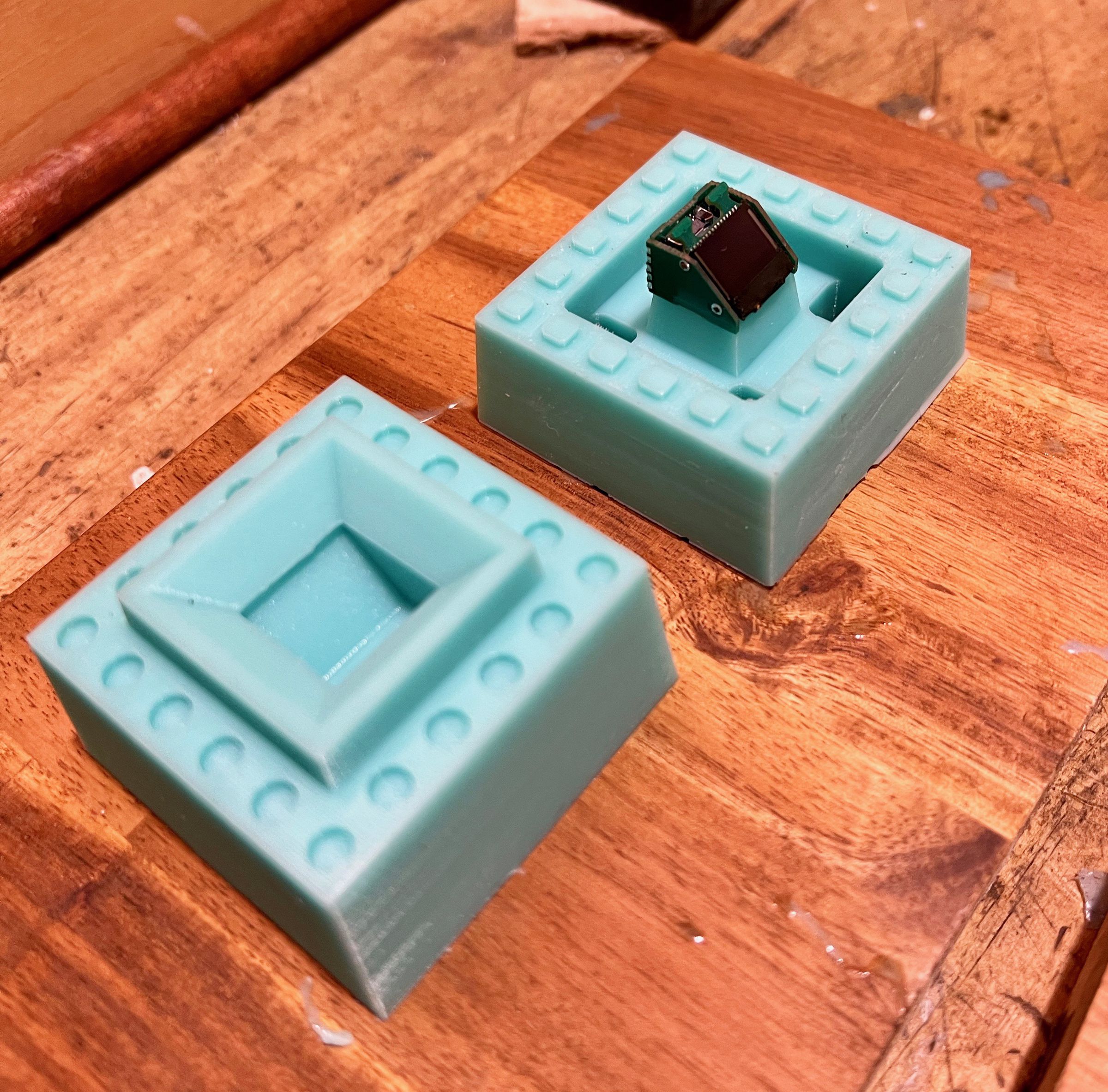Brown now has a 3D-printed jig as part of his mould. It lets him pour resin to form the brick-computer without first filling the brick’s cavity with silicone.