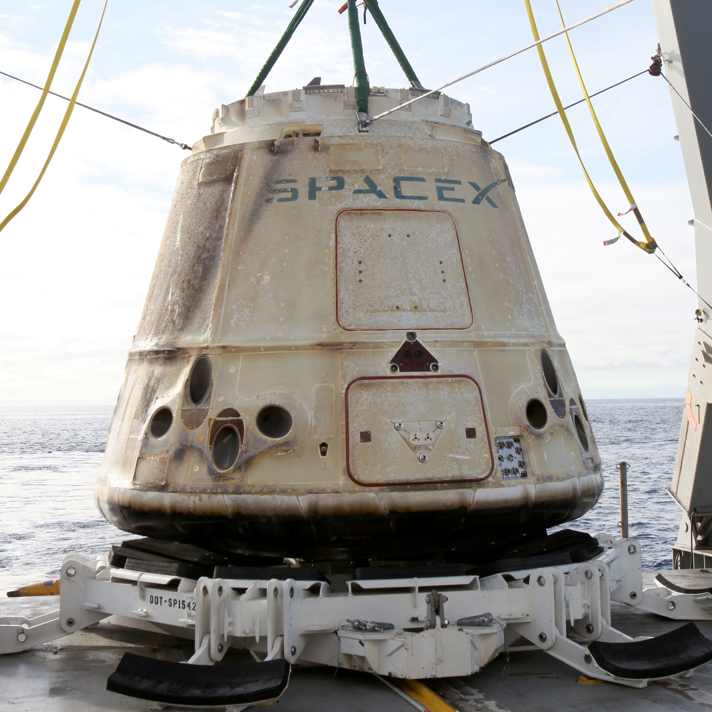 SpaceX’s logo on display on a Dragon capsule the company launched for NASA.