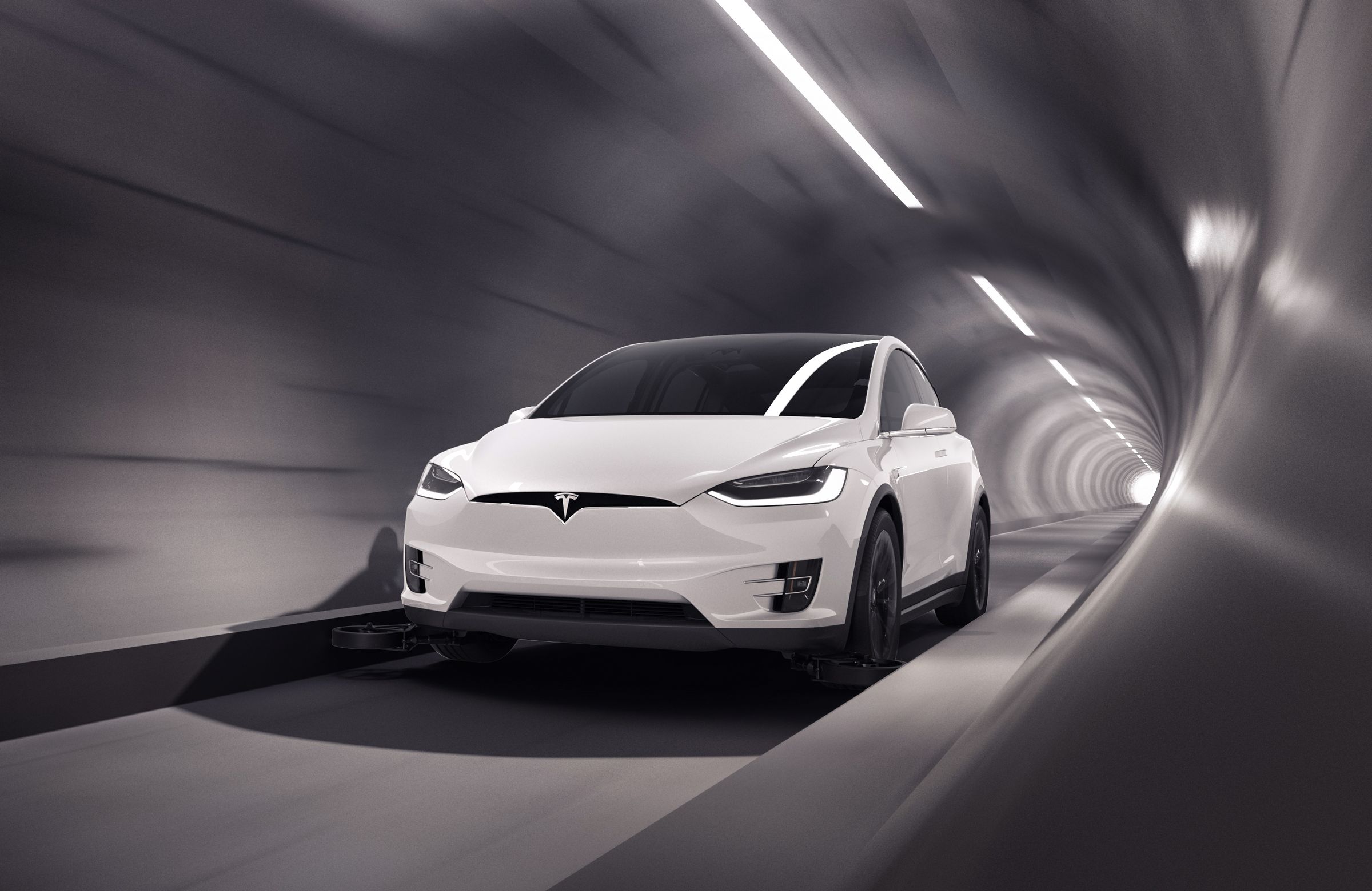 Rendering of a Tesla driving through a tunnel