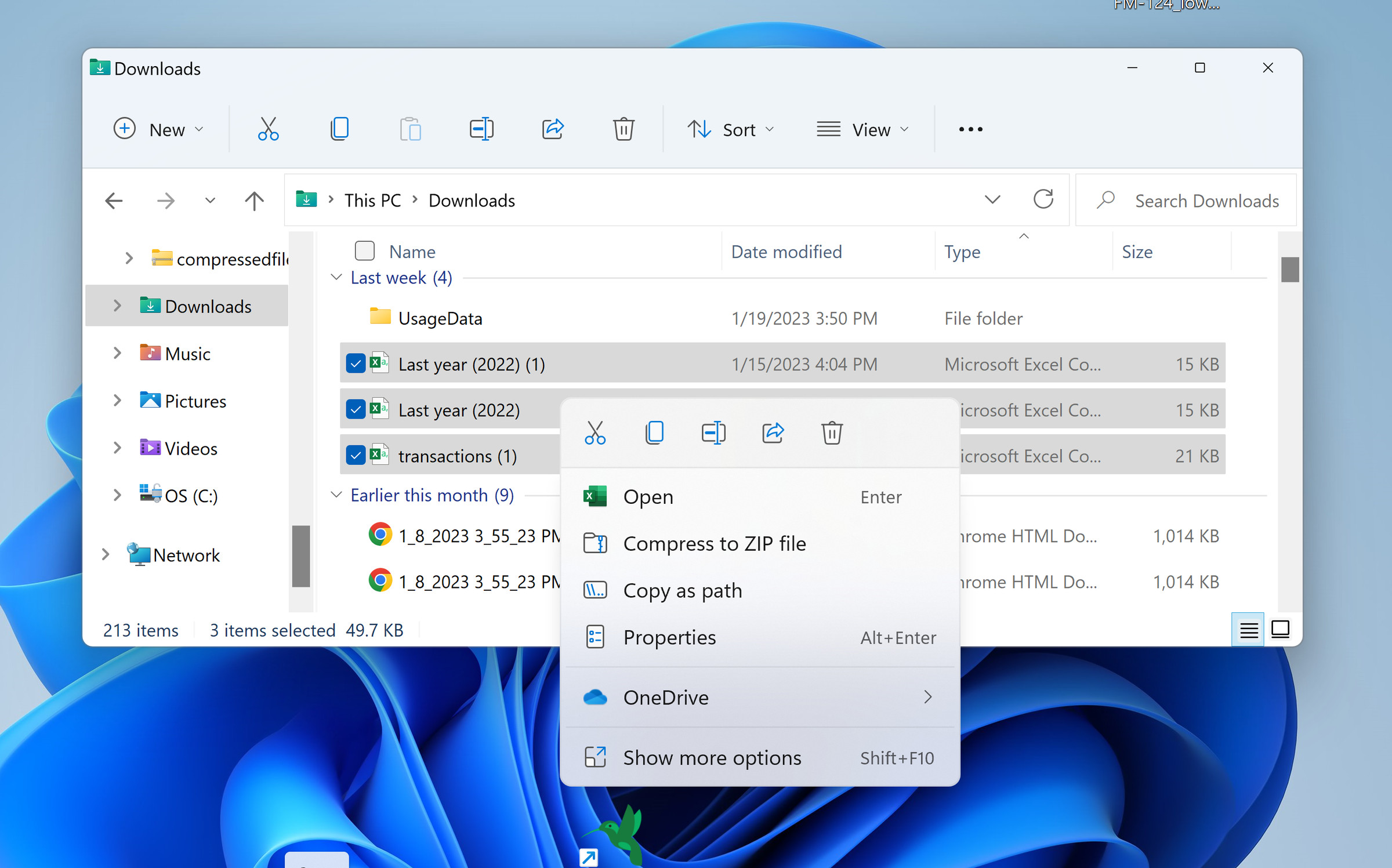 Una pantalla de Windows con el Explorador de archivos abierto, tres archivos resaltados y un menú desplegable.