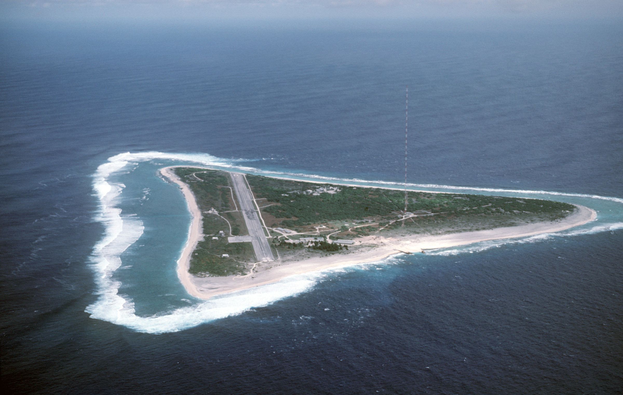 An aerial view of Minamitori Island taken in 1987. The rare earth ores were discovered in the seabed near the island.