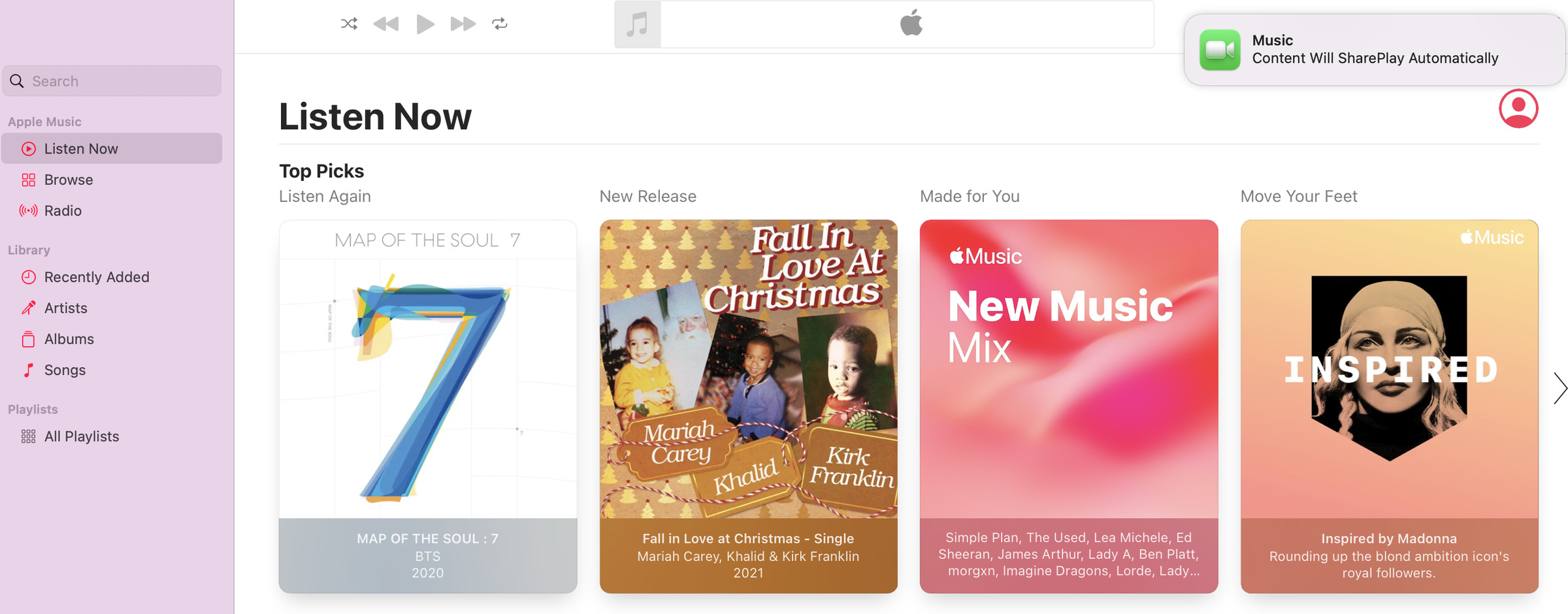A screenshot of an Apple Music interface. A notification in the top right reads “Music: Content will SharePlay automatically”.