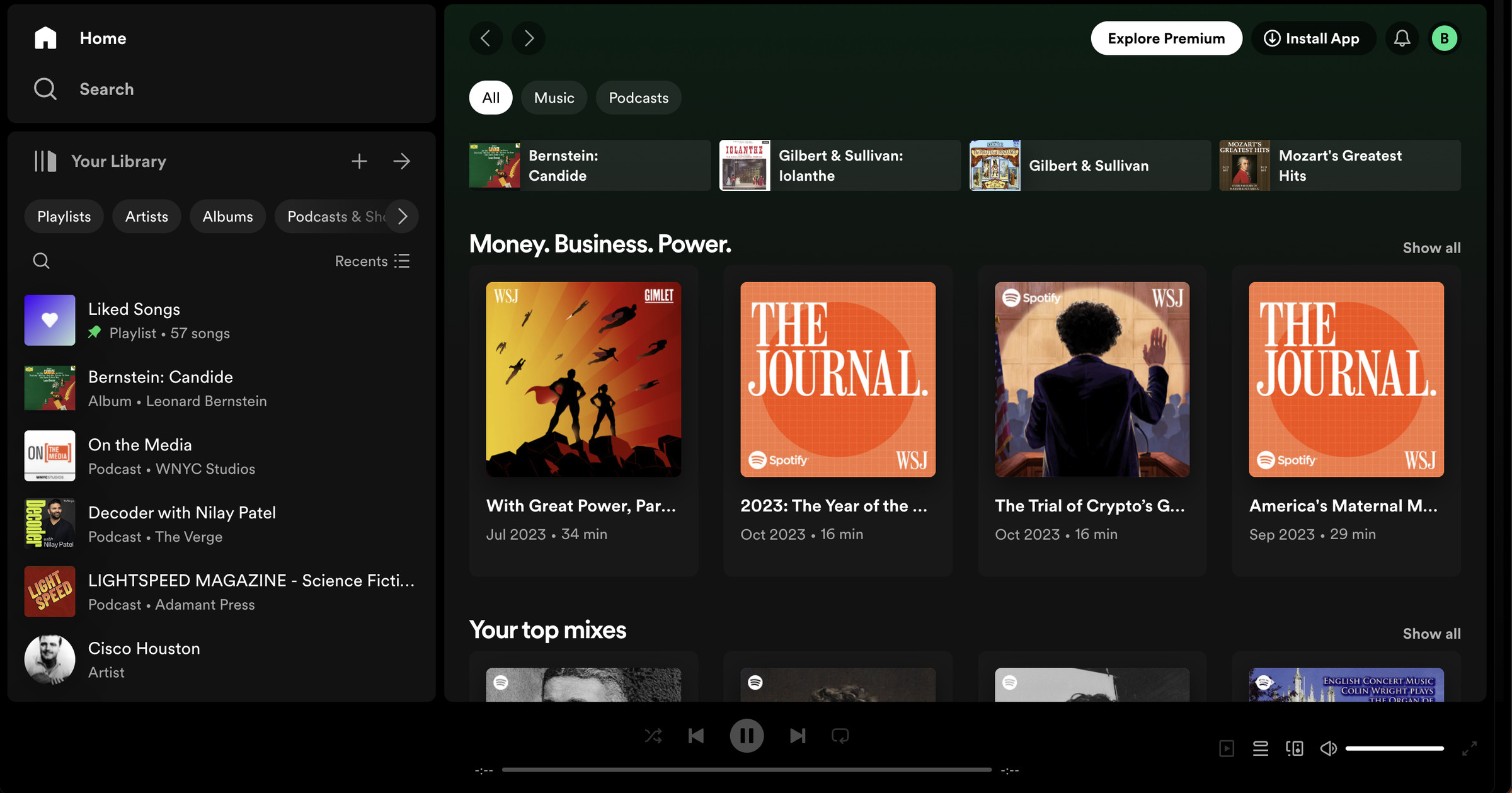 Spotify website with list of favorites on left, business podcasts with large icons in center.