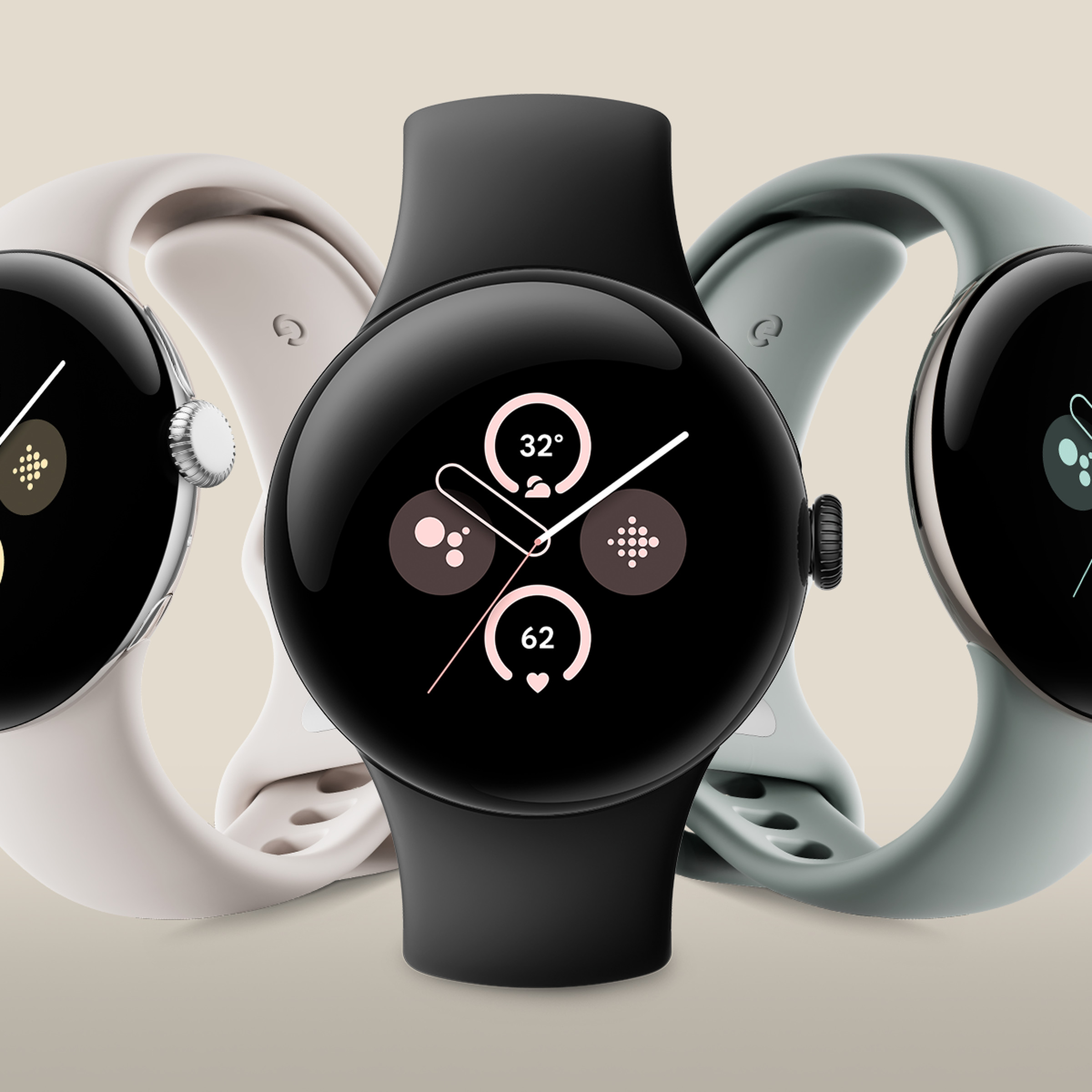The Google Pixel Watch 2 in its three case colors and finishes (left to right) : polished silver, matte black, and champagne gold.
