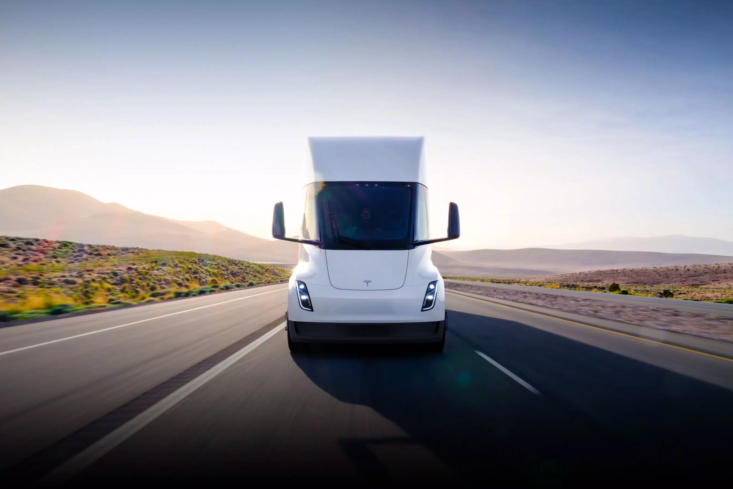 A Tesla Semi Truck on a road.
