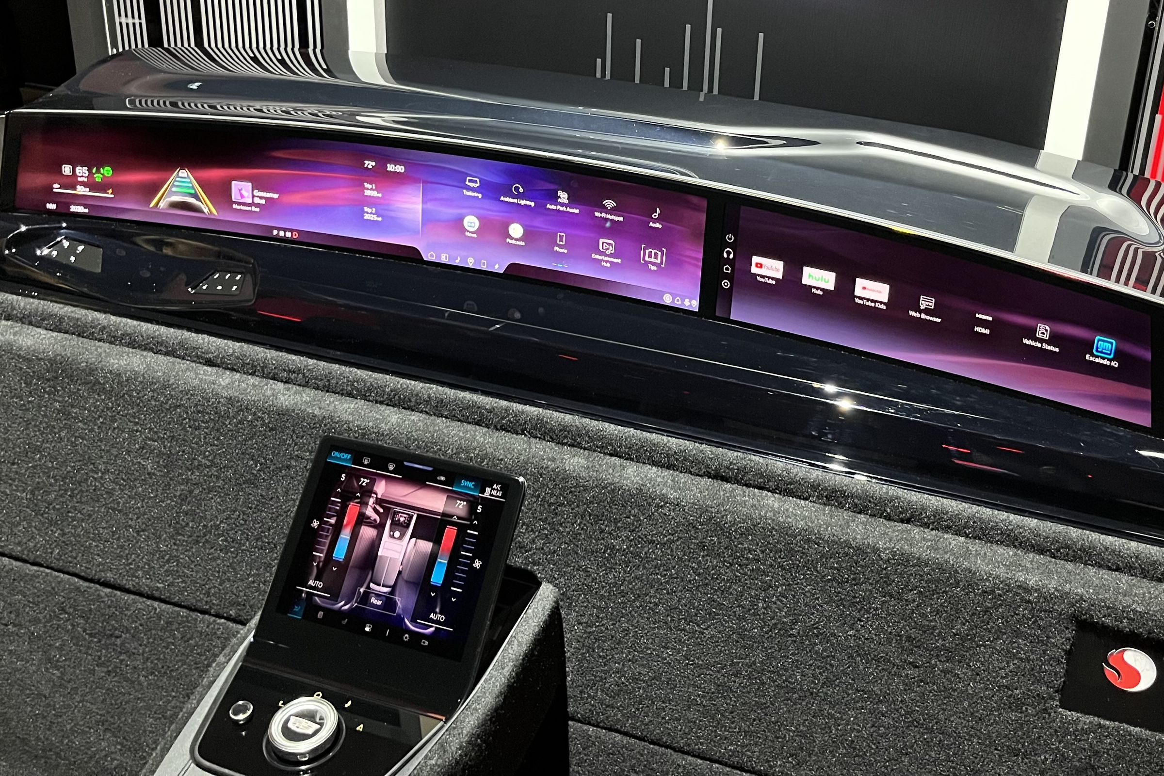 Kiosk showing just the panoramic display dashboard that goes inside the Escalade IQ along with a driver control screen panel under it