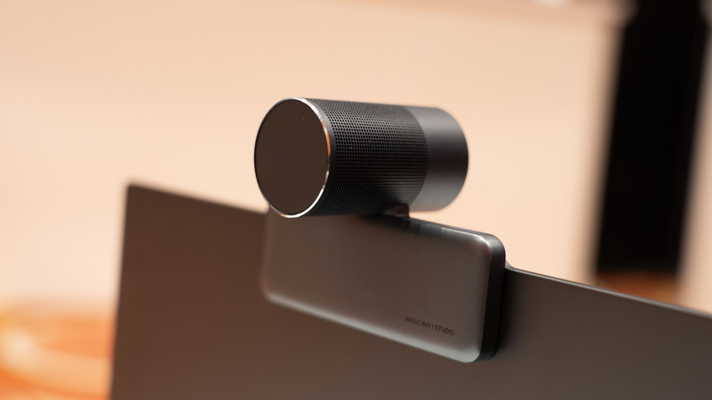 An image of the rear of a 4K webcam attached to the top of a laptop.