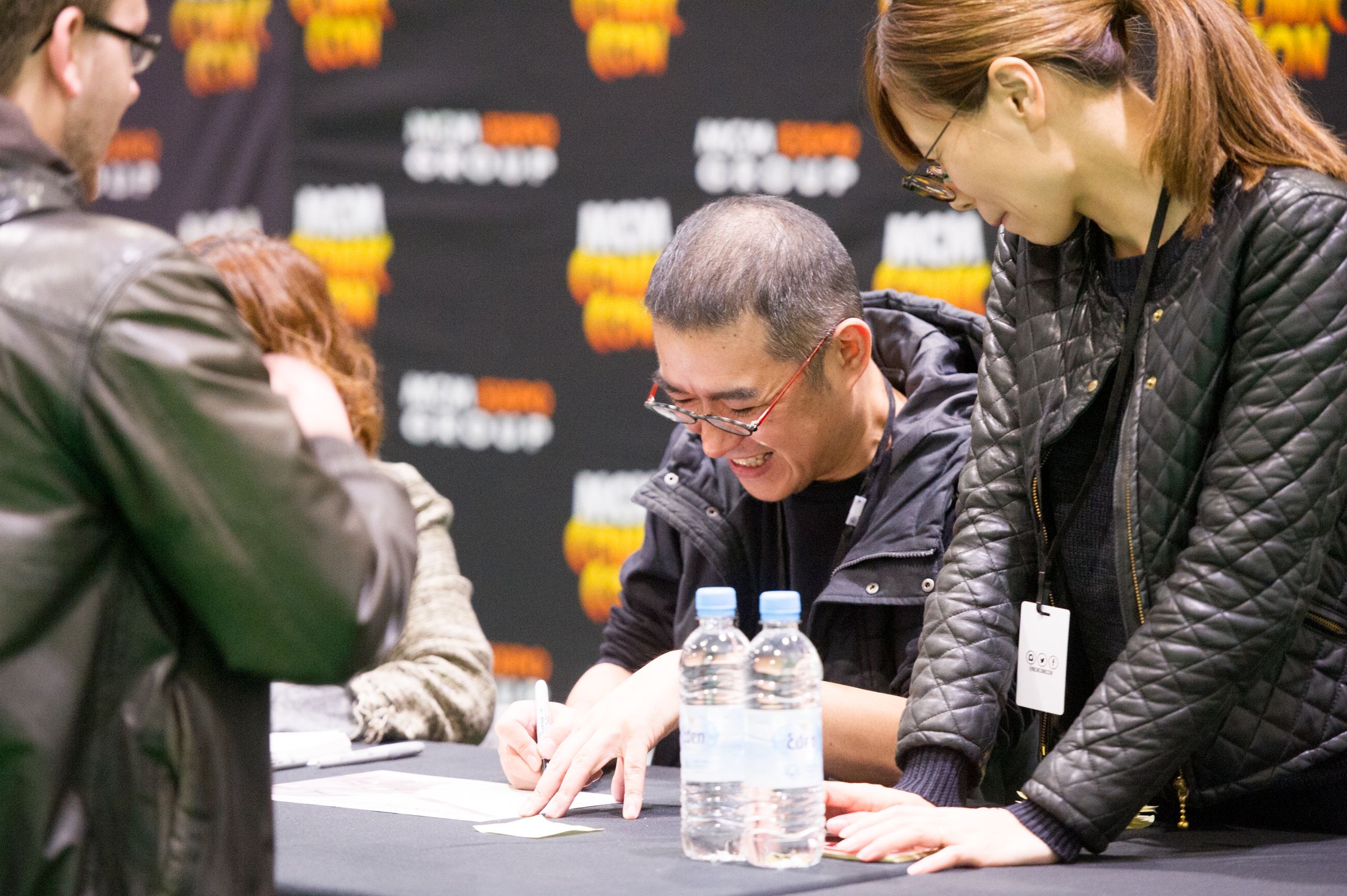 Japanese animator, designer, and animation director Takeshi Honda meeting fans on day 3 of the MCM London Comic Con at ExCel on October 30, 2016 in London, England.