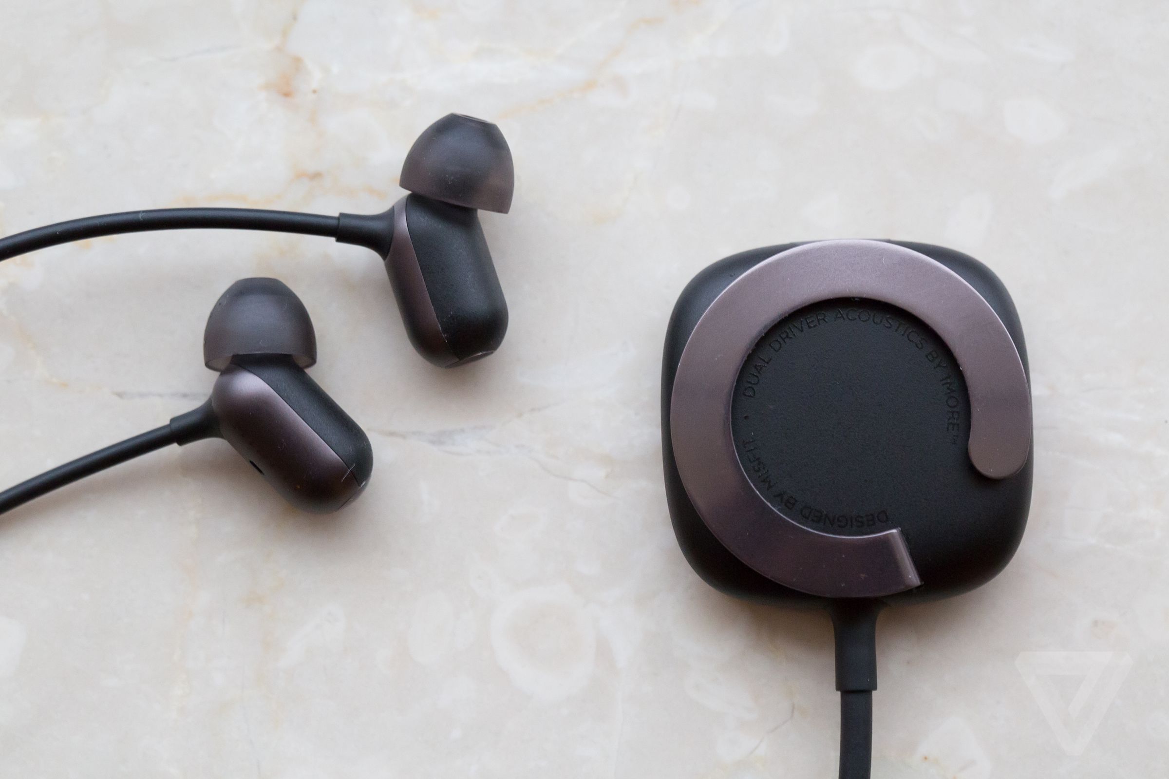 Misfit Specter Bluetooth earbuds in photos