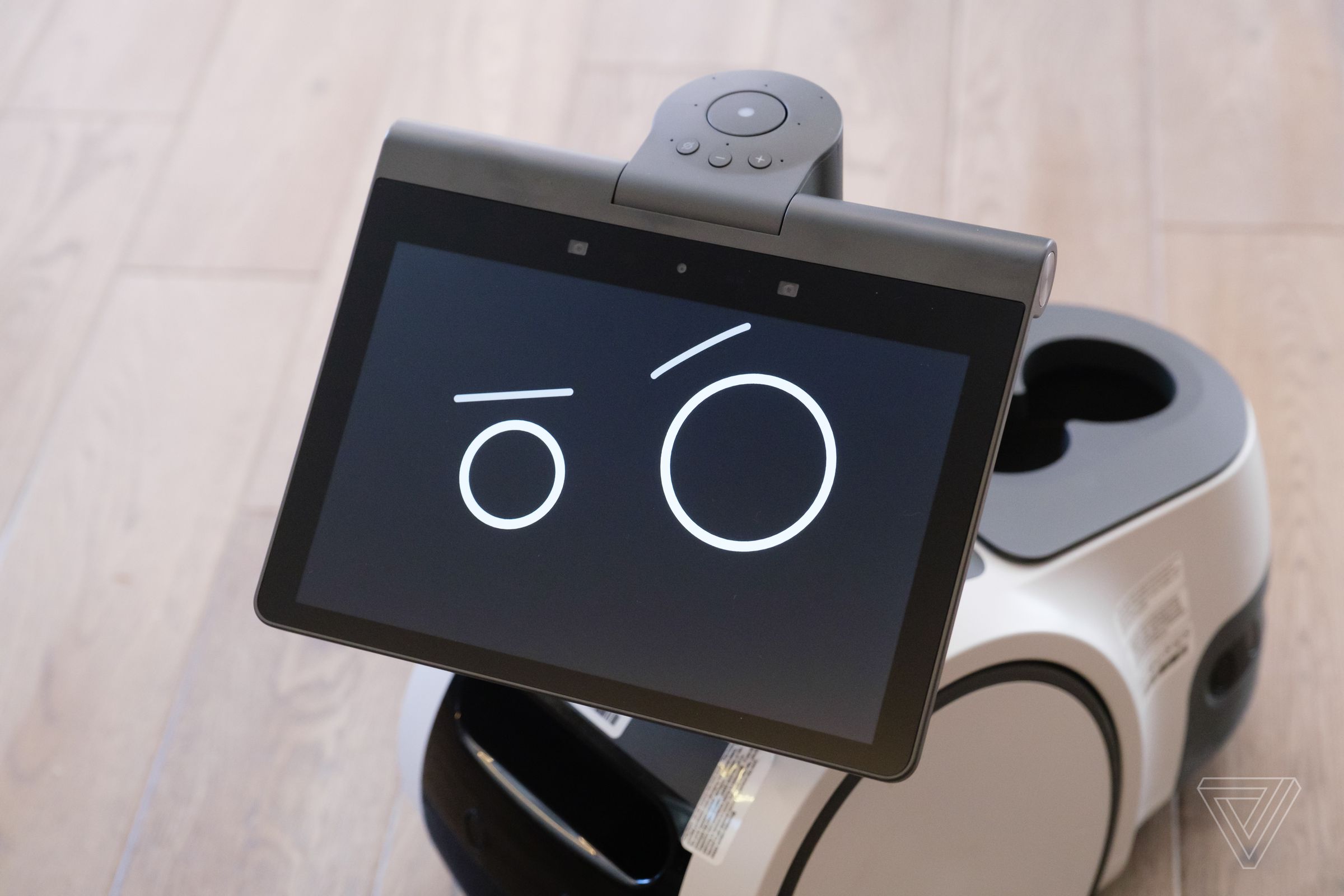 The Astro uses the circles on its screen to express different emotions.