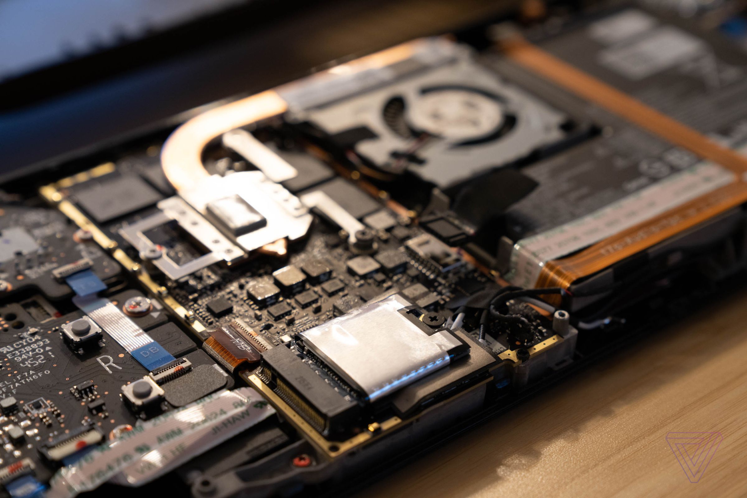 The Steam Deck’s SSD is inside the silver square. That’s the EMI shield, which can slide off or pop open.