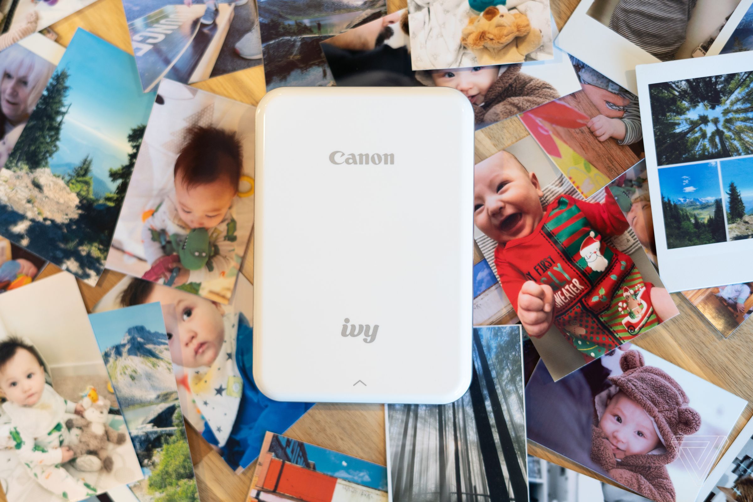 Canon Ivy on a backdrop of instant prints