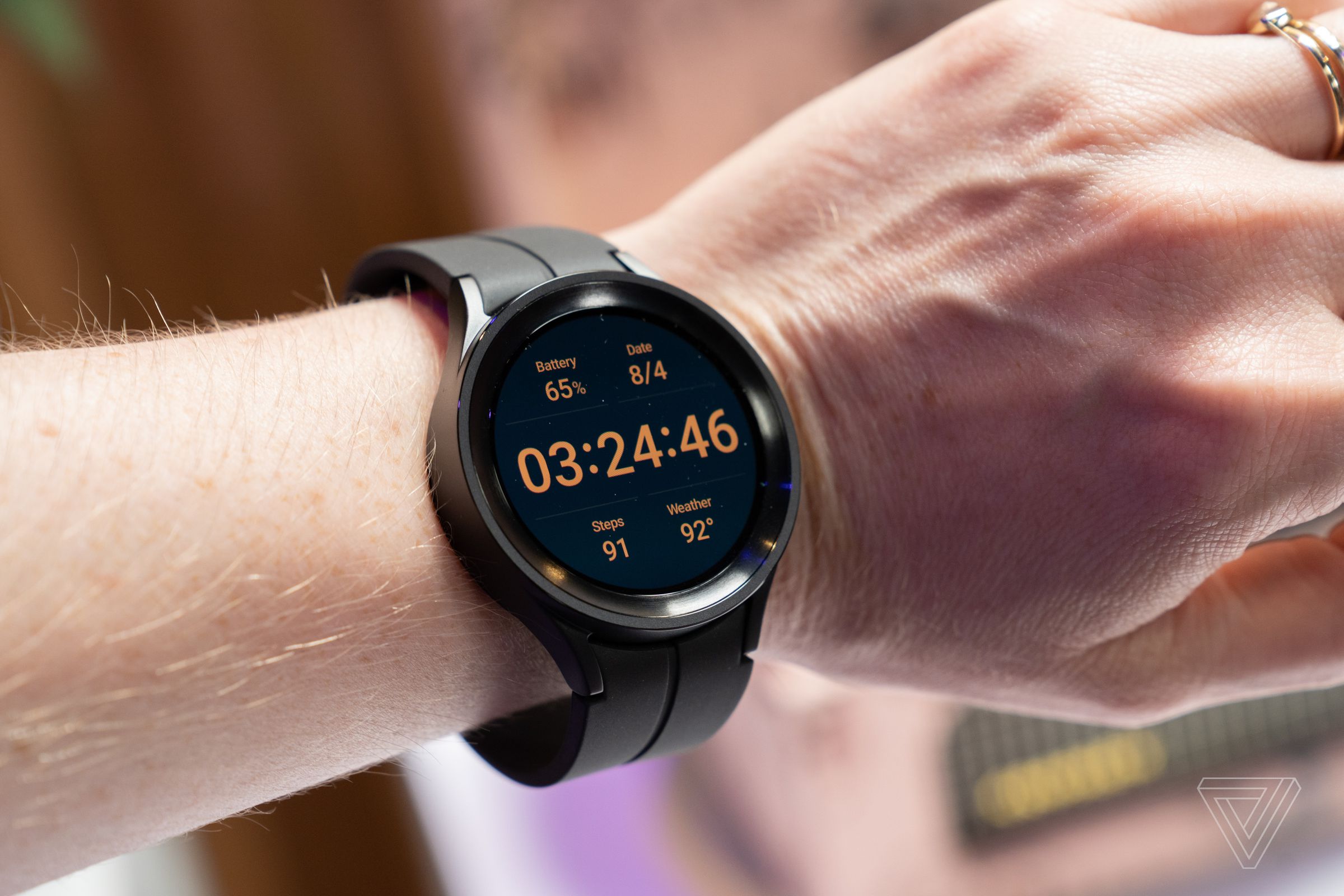 The Galaxy Watch 5 Pro on a wrist displaying fitness metrics