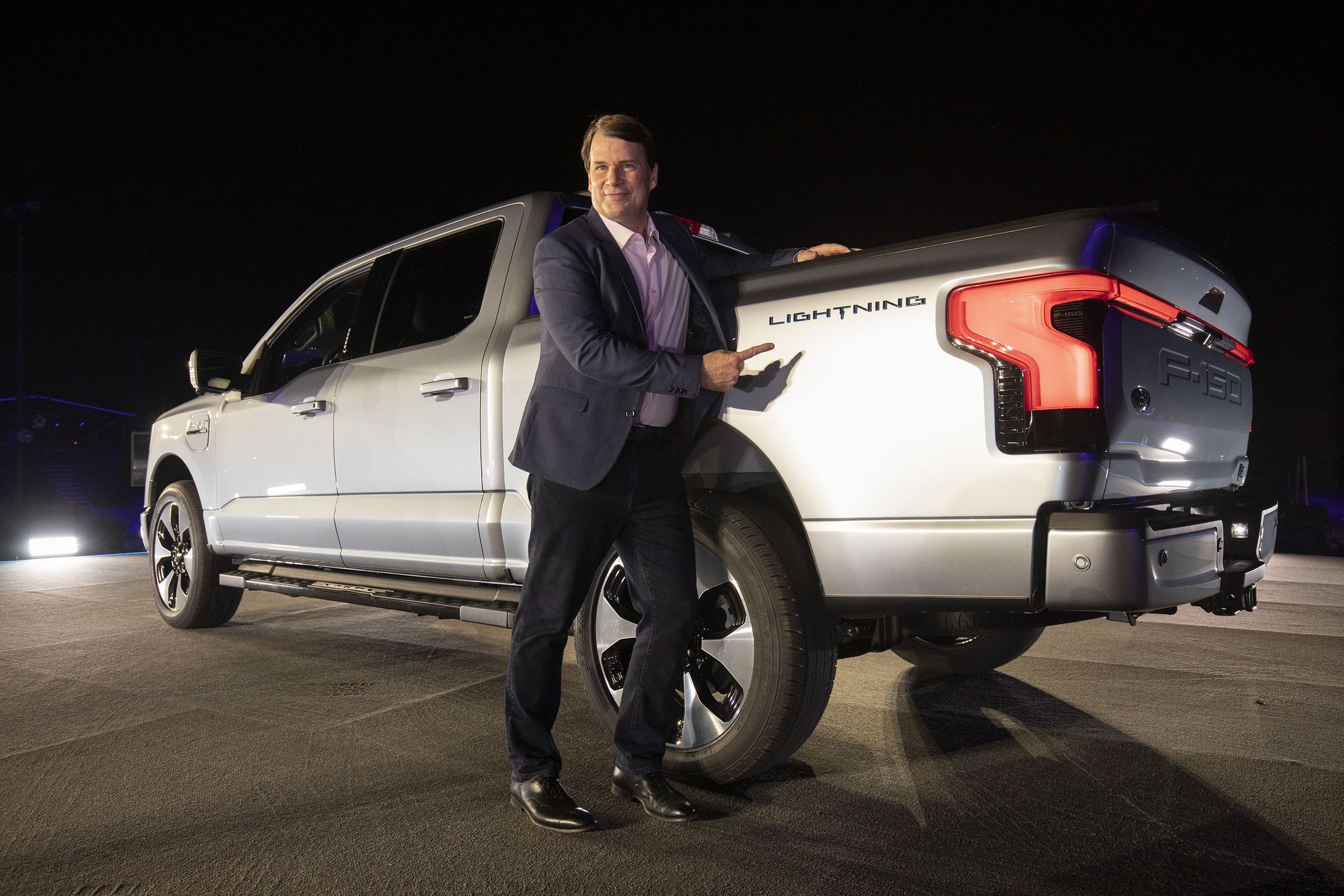 Ford CEO Jim Farley with an F-150 Lightning