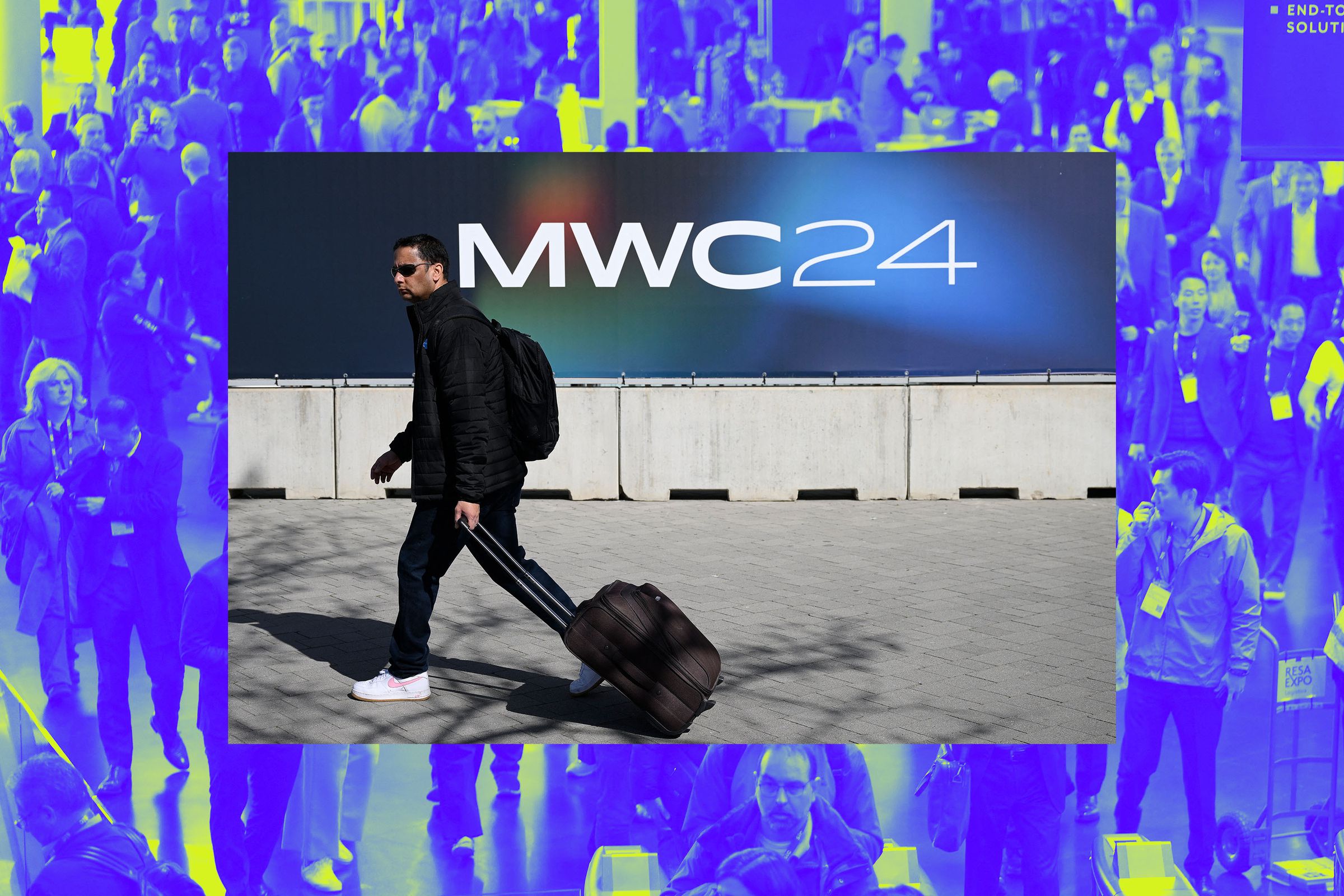 An image of a person walking with a MWC sign in the background.