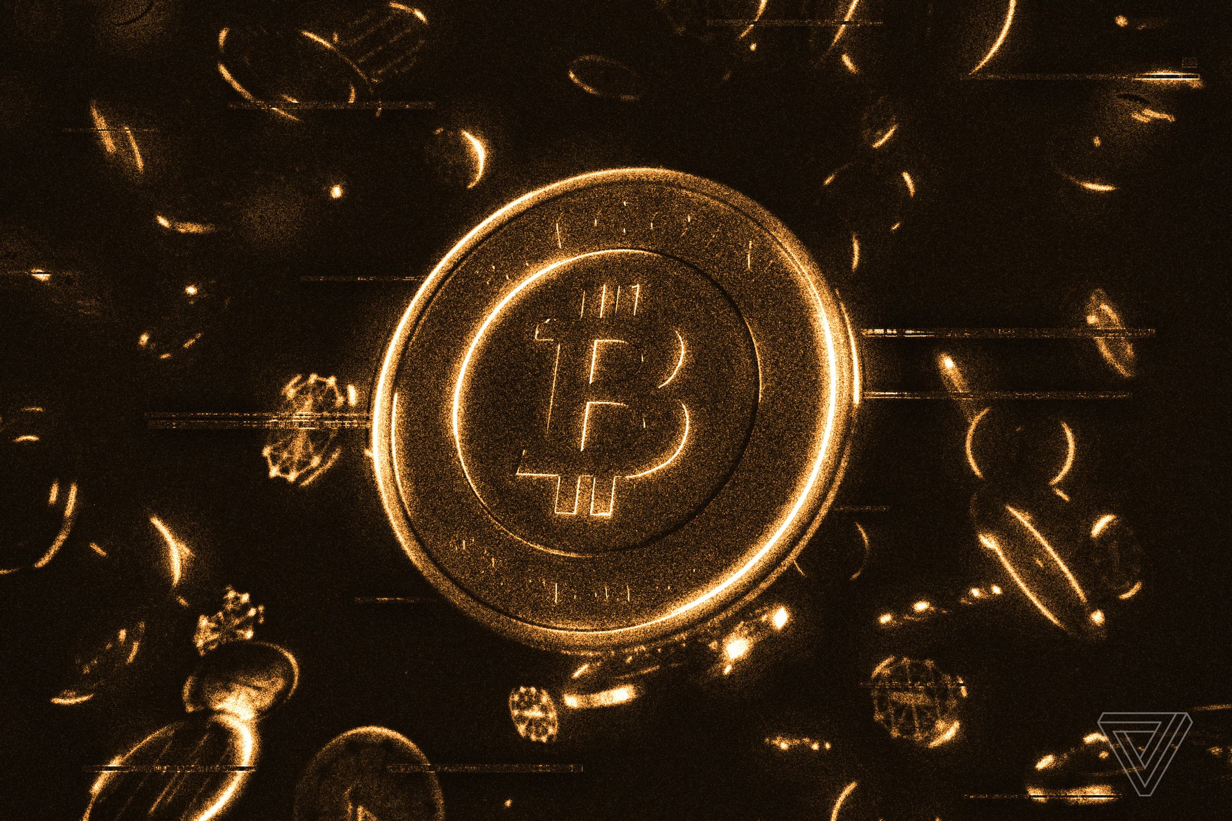 An image of the Bitcoin logo on a gold coin surrounded by other coins