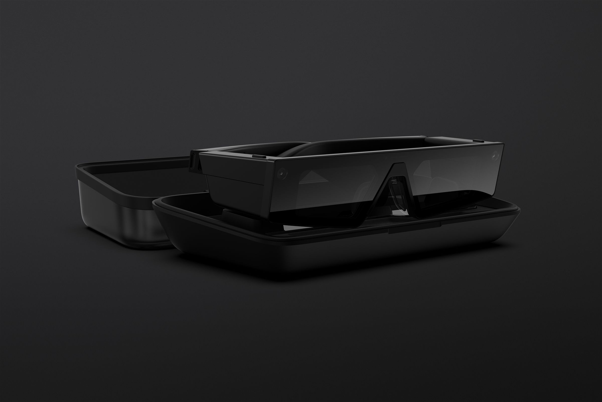 The glasses fold up and fit inside a black charging case.