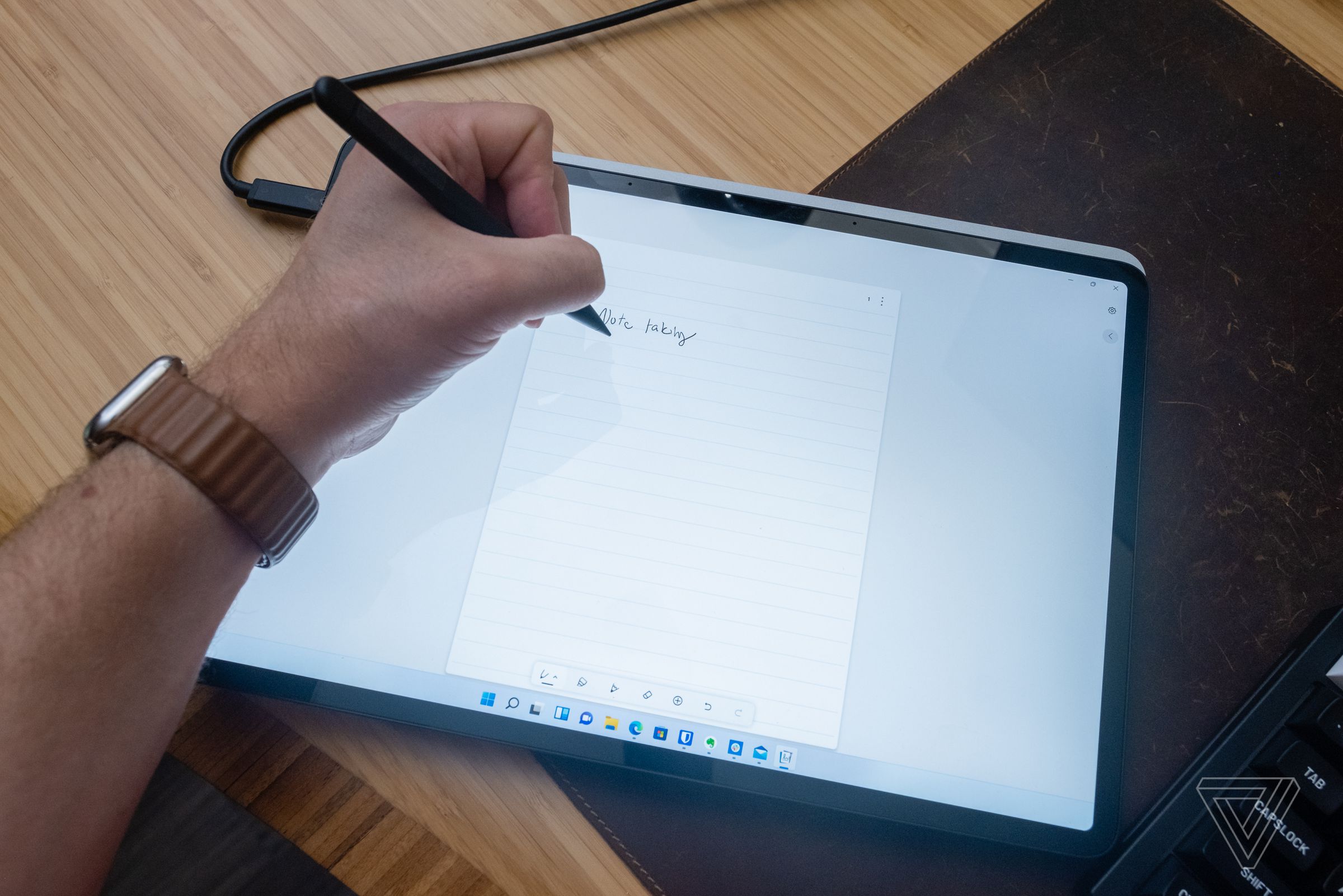 The flat position of the screen is ideal for note taking or drawing with the Surface Pen.