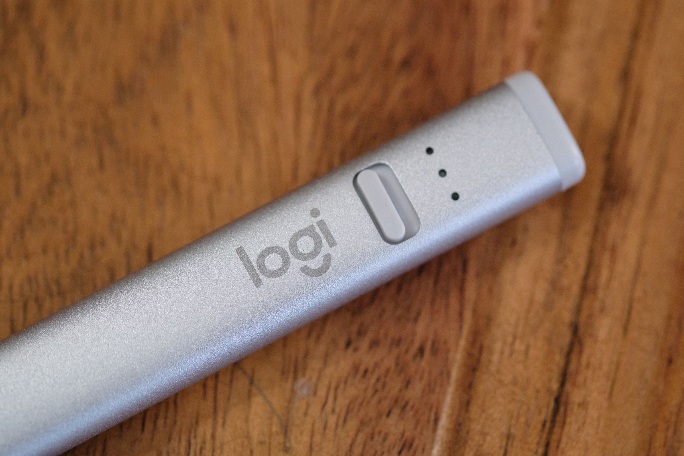 A close-up of the Logitech Crayon's power switch and battery gauge.