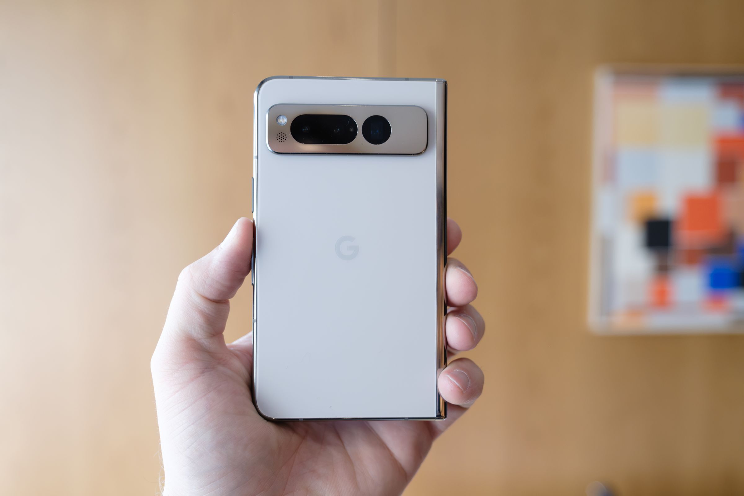 The back of the Pixel Fold showing its three rear cameras.