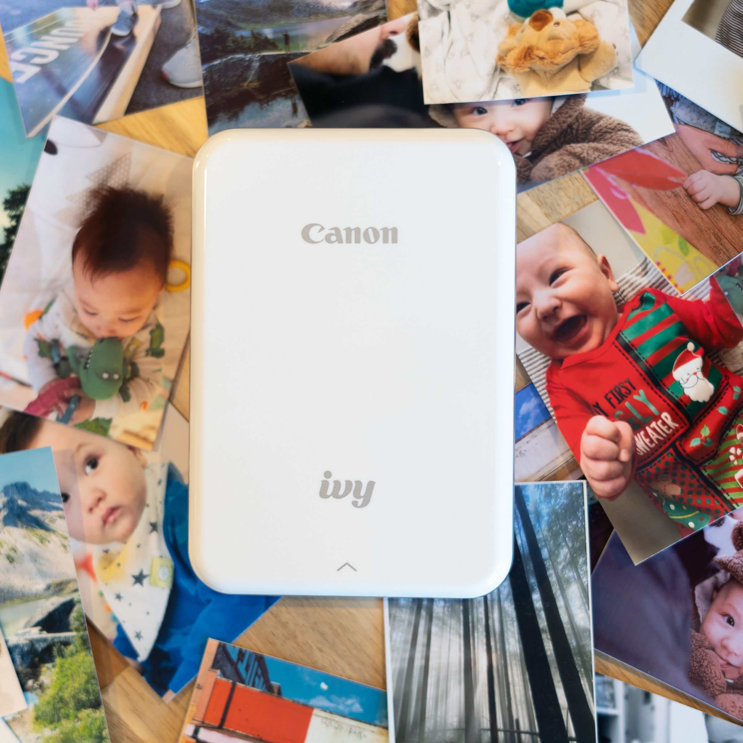 Canon Ivy on a backdrop of instant prints