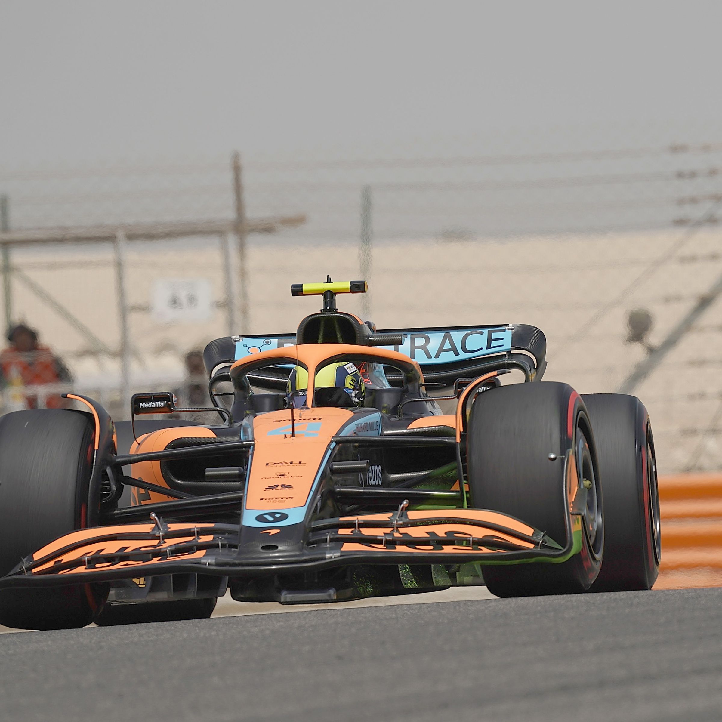 Picture of a Formula 1 car driving on a track.