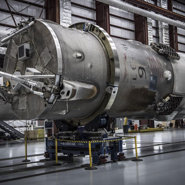 SpaceX transports its landed Falcon 9 rocket to its temporary home in ...