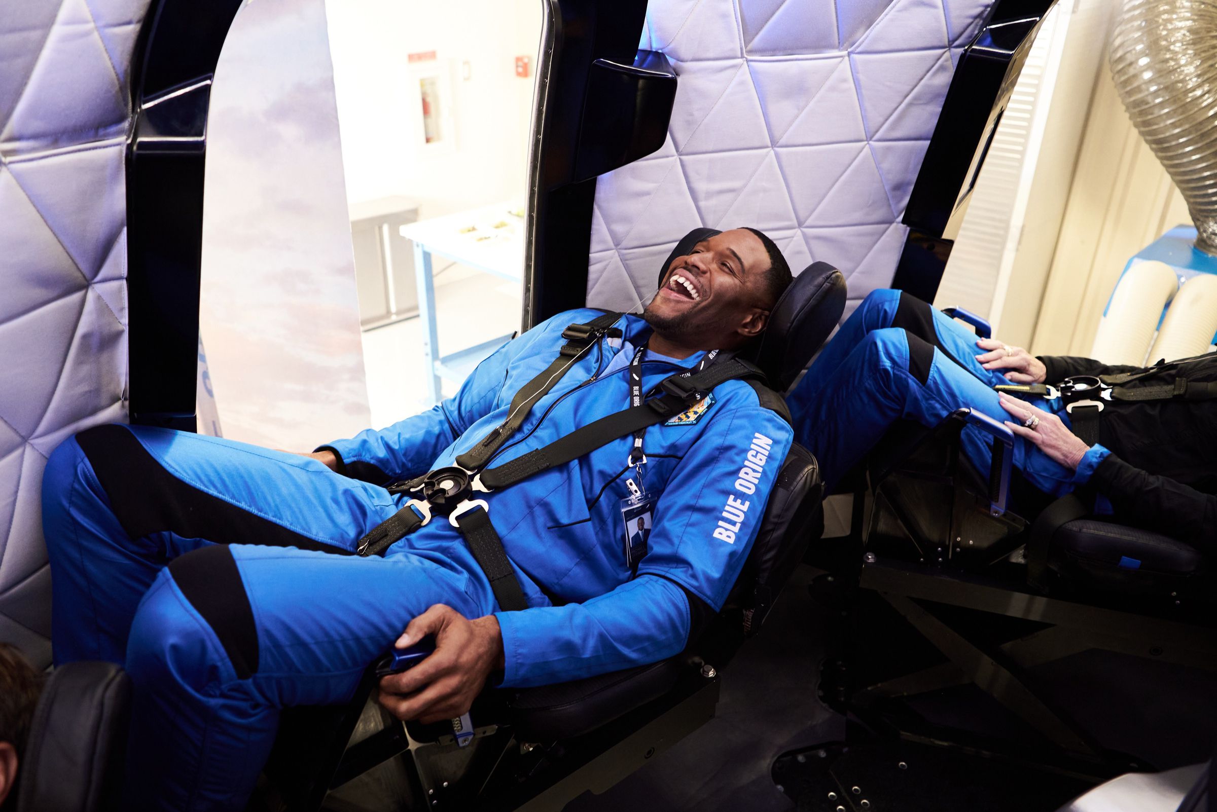 Michael Strahan training in one of New Shepard’s passenger seats