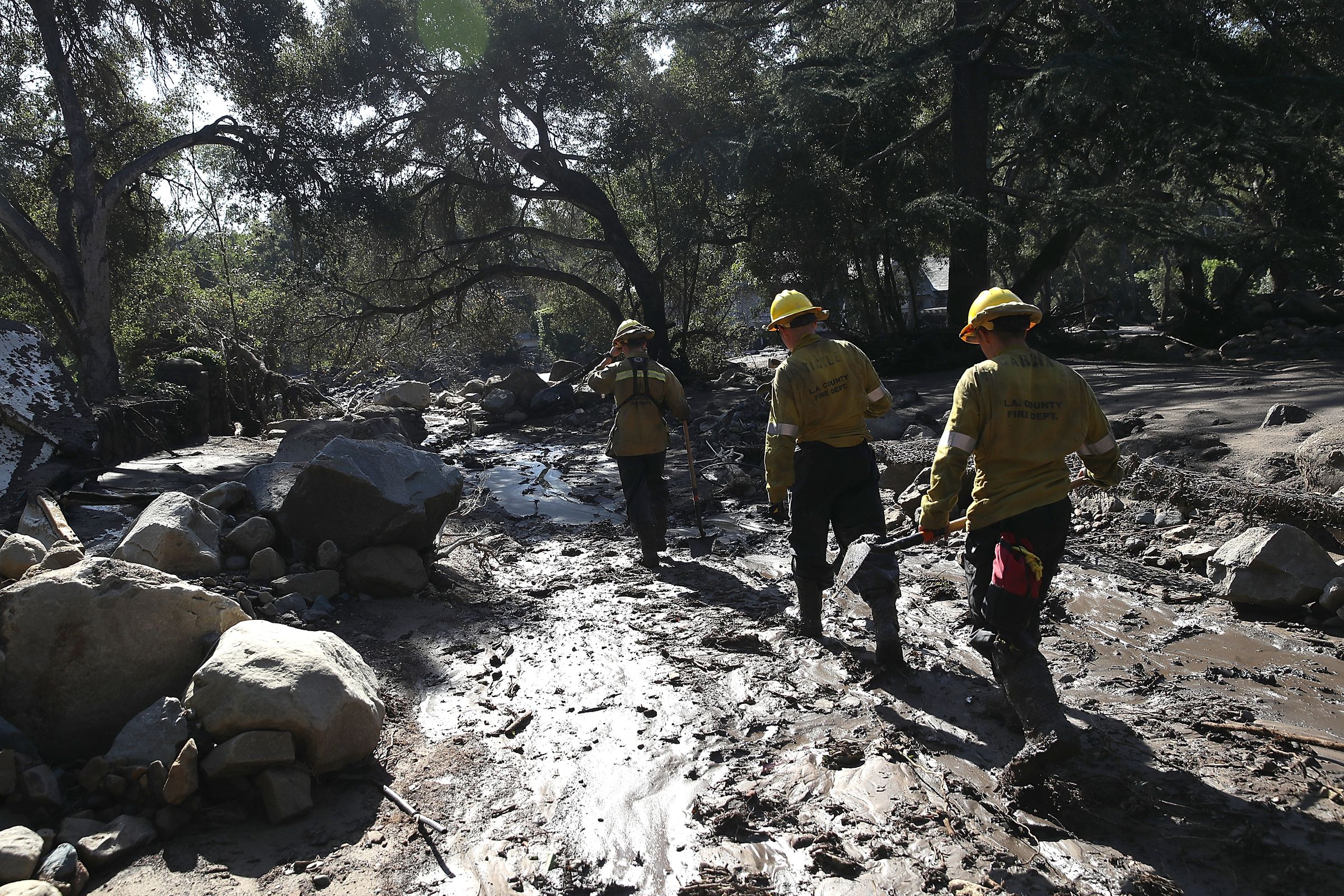 Search and rescue team in a neighborhood destroyed by the mudslides in Santa Barbara County in January. 