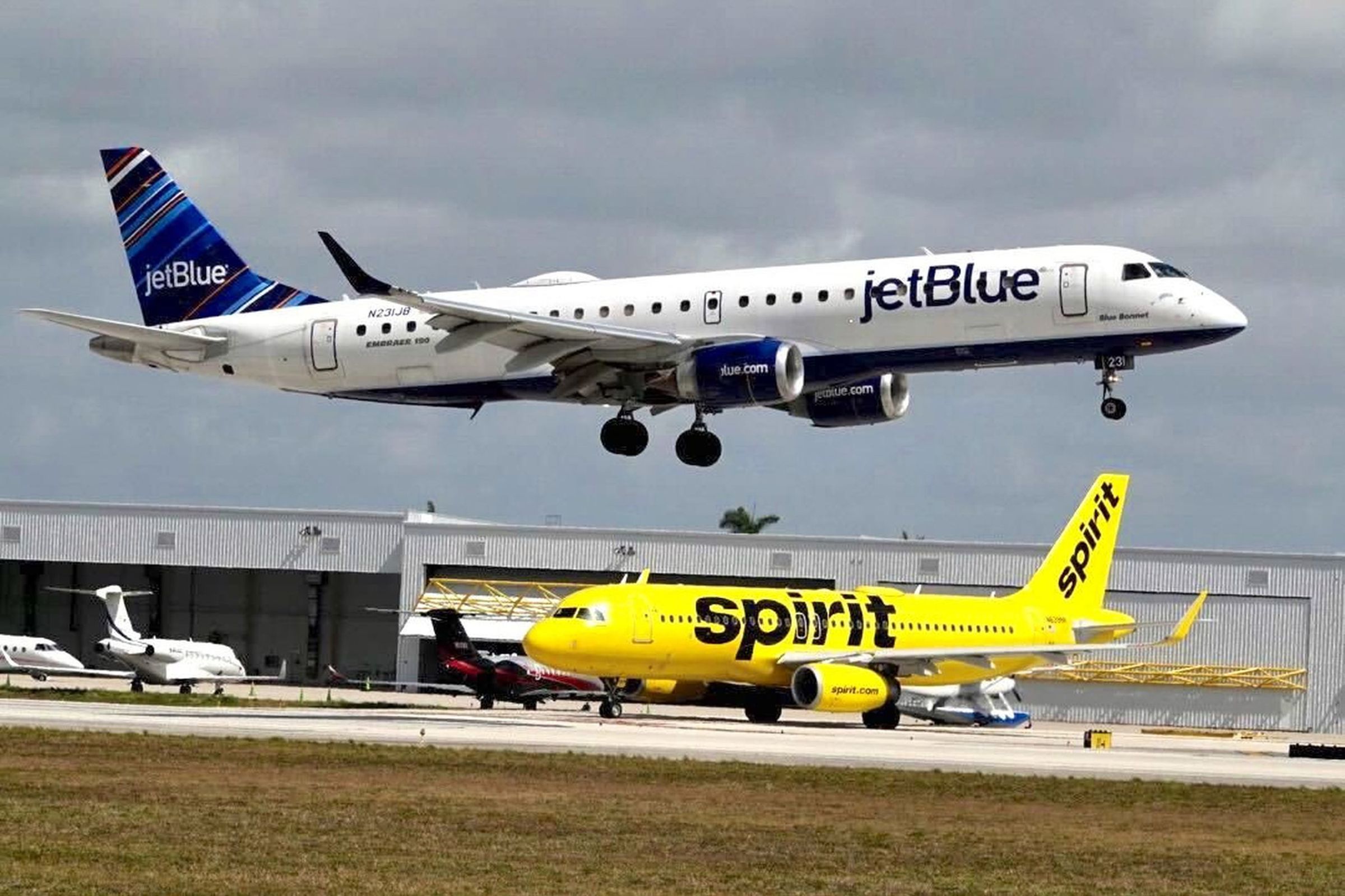 A JetBlue and Spirit Airways plane at a Florida airport