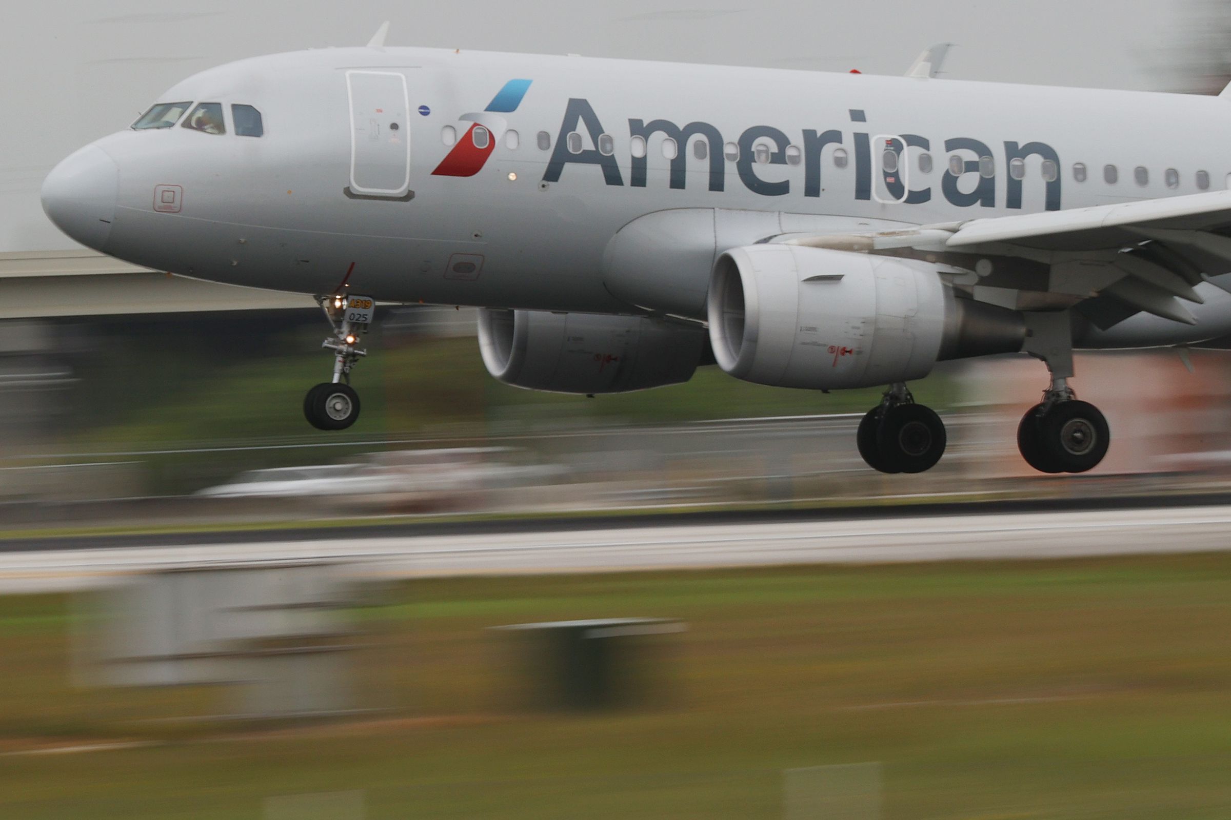An American Airlines plane prepares for takeoff