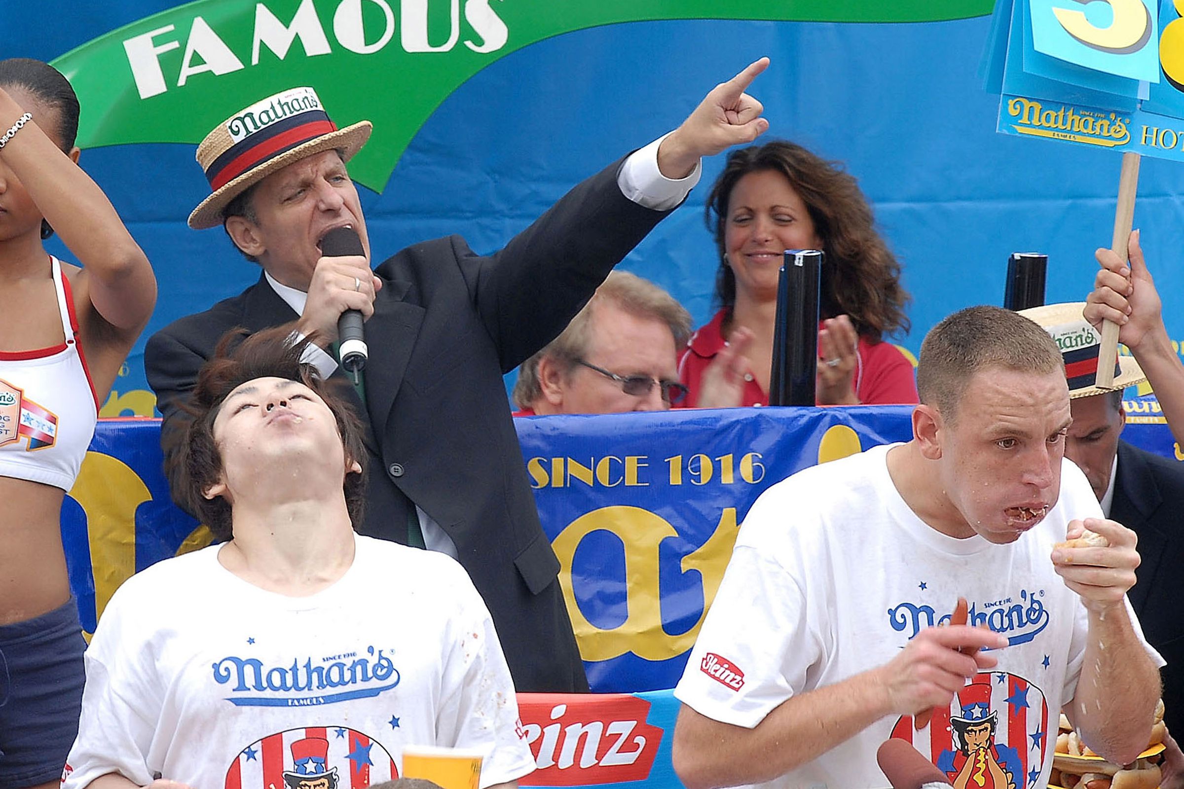 Takeru Kobayashi (L) and Joey Chestnut (R) competed during the 92nd Annual Nathan’s Famous International Hot Dog Eating Contest in 2007.