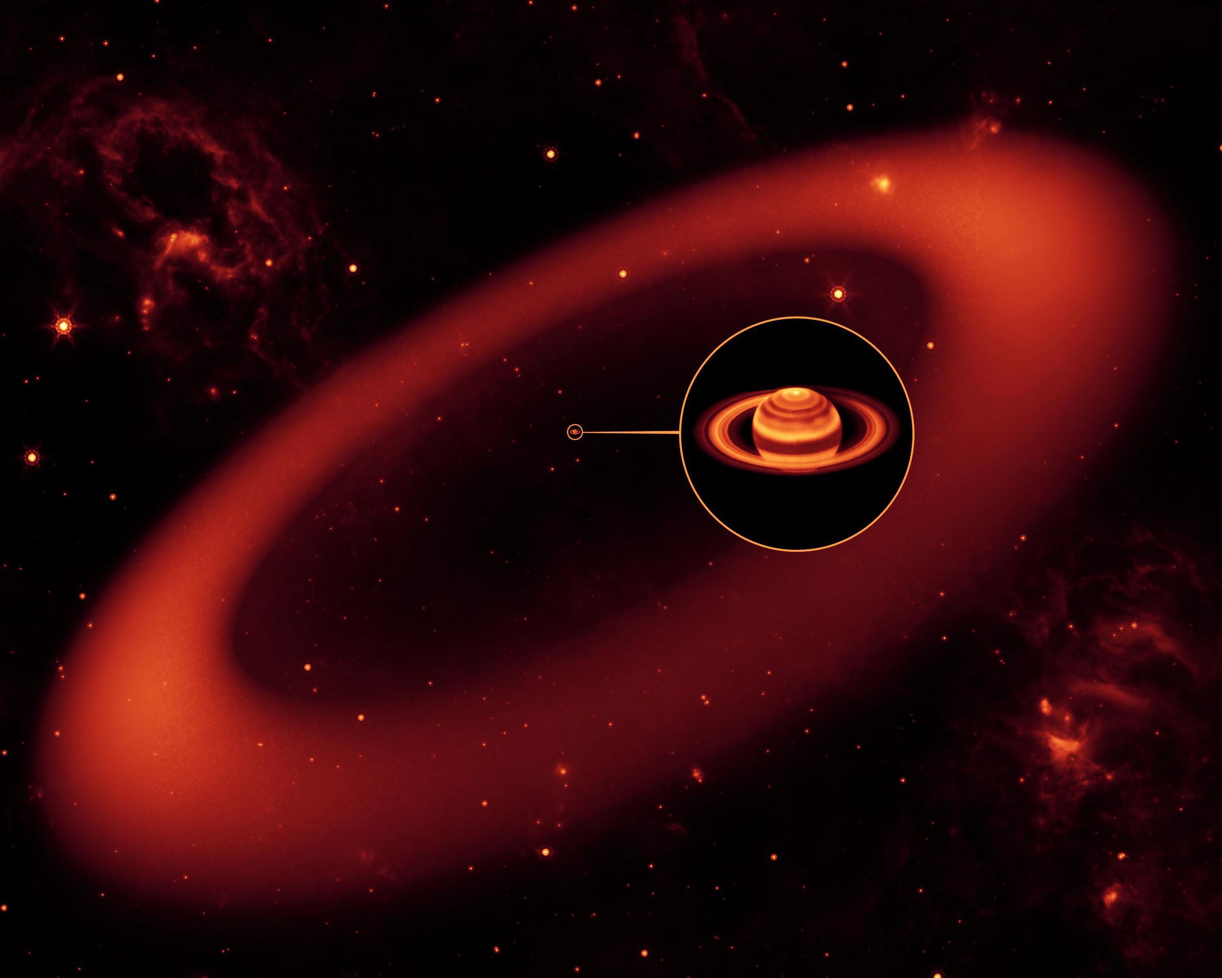 An artistic rendering of the invisible ring of Saturn, discovered by Spitzer