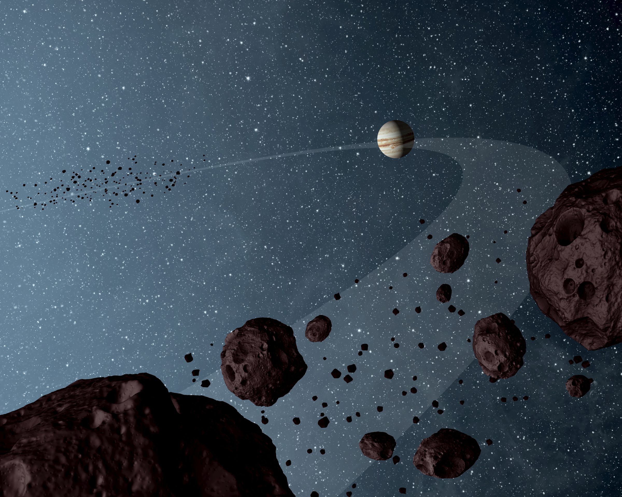An artistic rendering of the Trojan asteroid swarms, with one clump ahead of Jupiter and another clump trailing Jupiter.