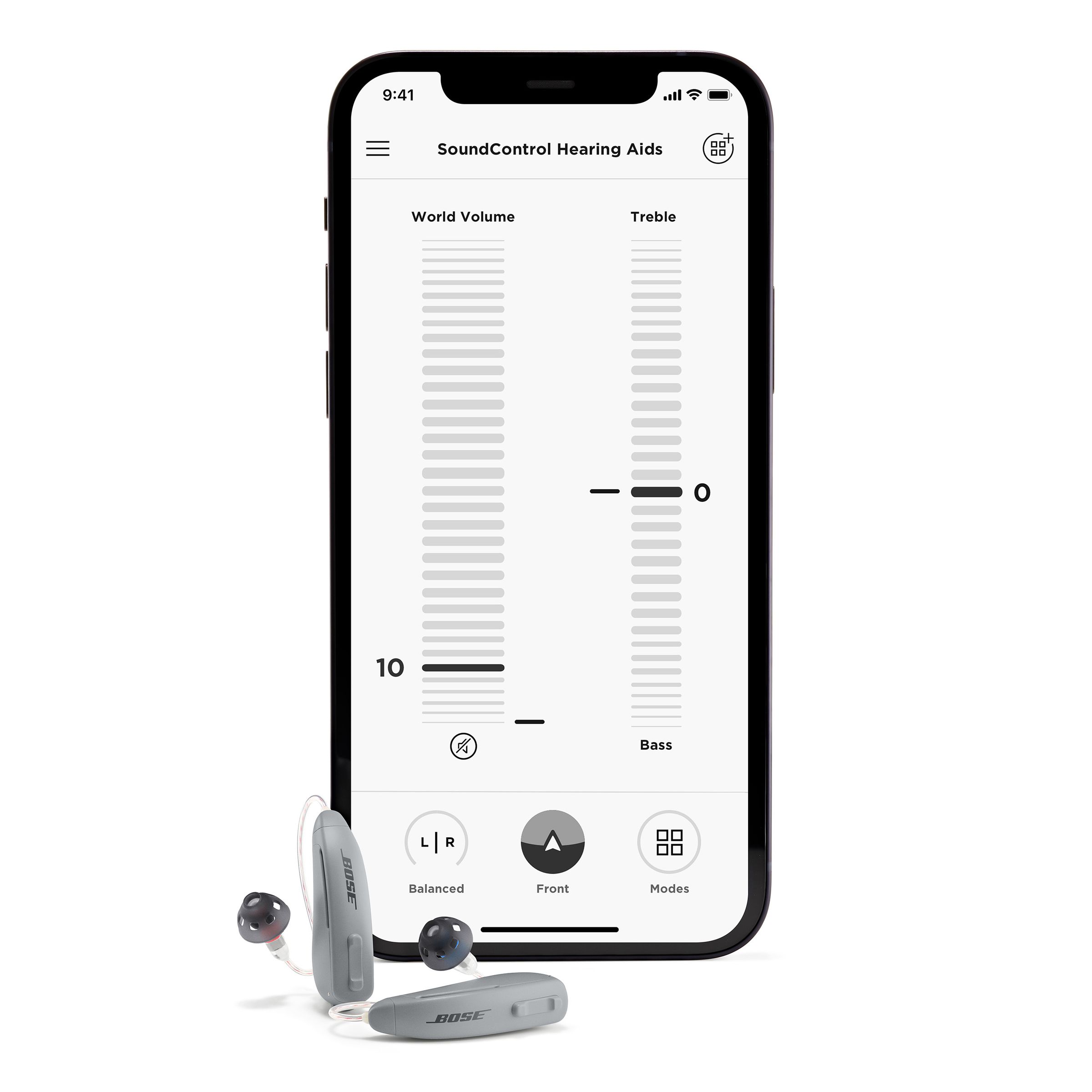 A smartphone propped next to the Bose hearing aids. On the phone’s screen is a page that shows scrolling sliders for adjusting World Volume on the left and Treble and Bass on the right.