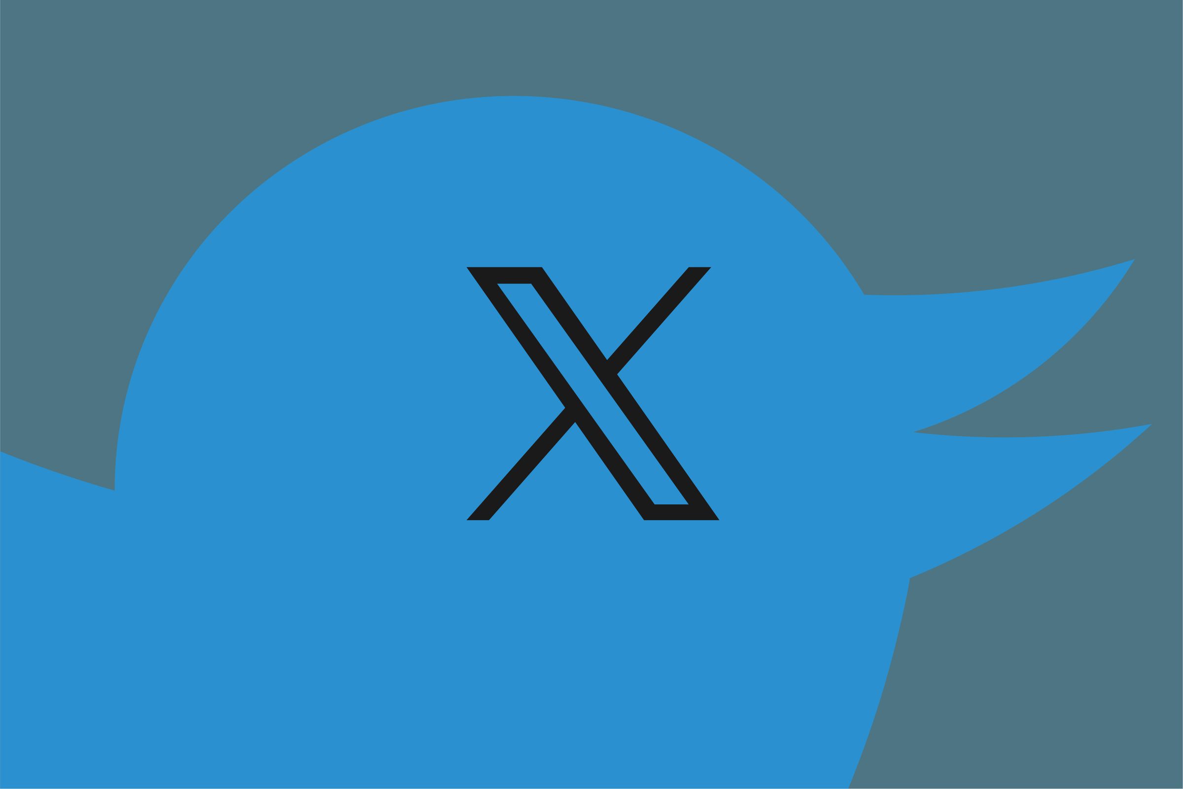An image showing nan erstwhile Twitter logo pinch nan X logo connected its head