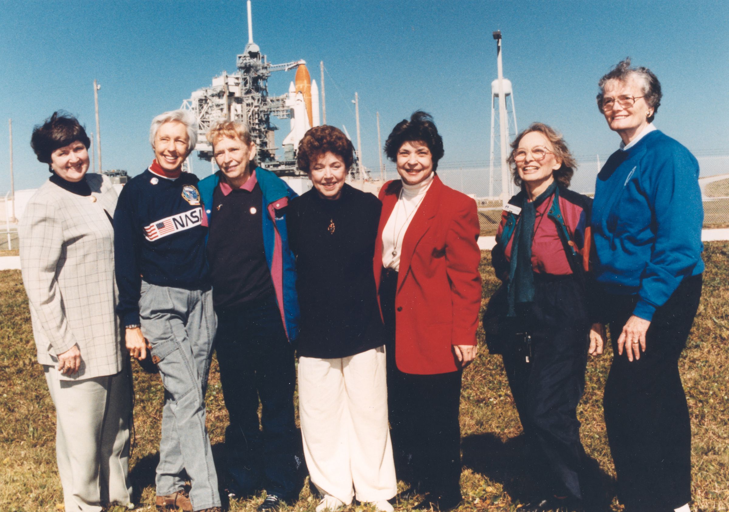 Seven of the Mercury 13 women in front of the Space Shuttle in 1995.