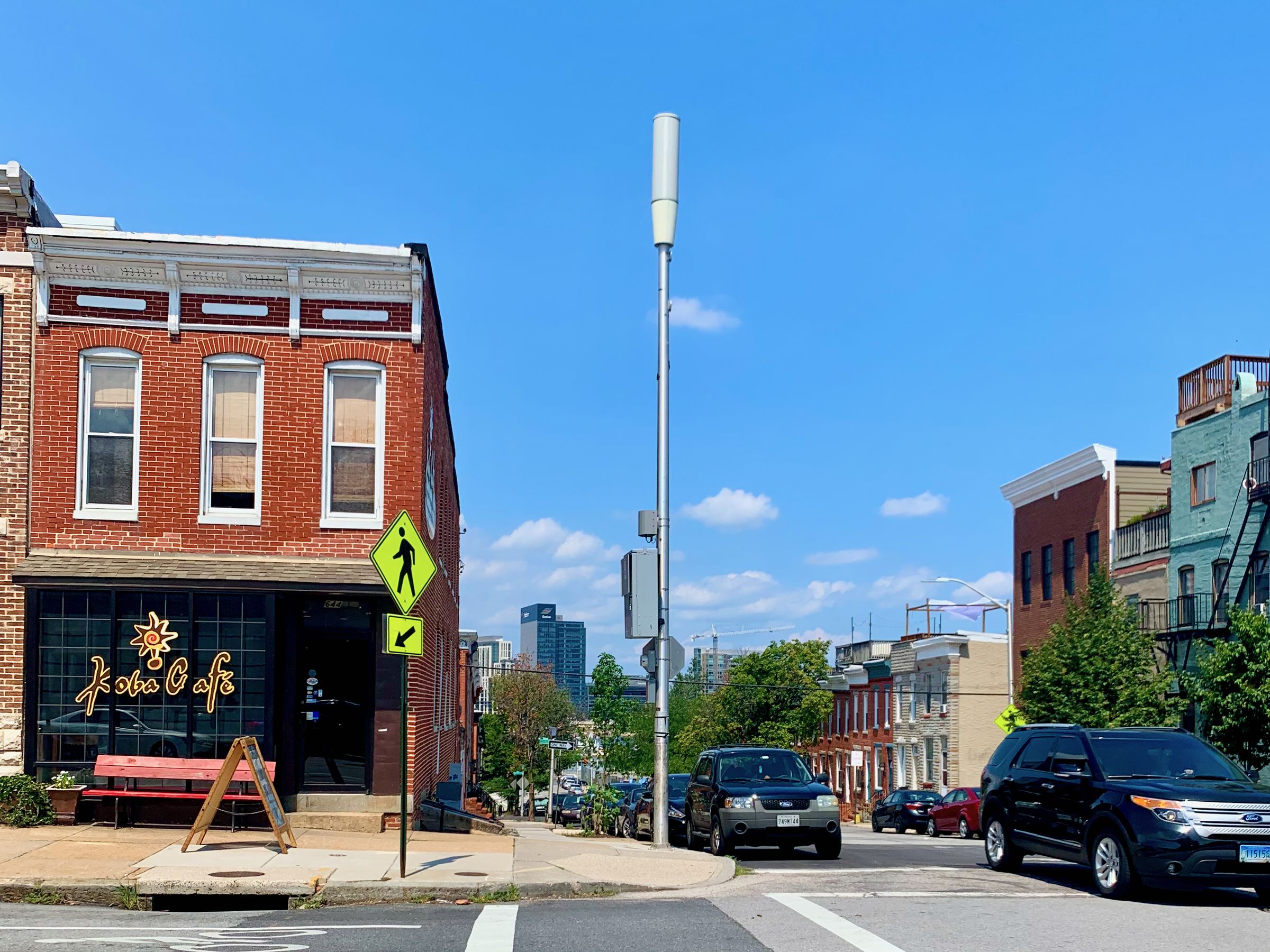 This small cell tower tower looks like a street light post in downtown Baltimore, MD.