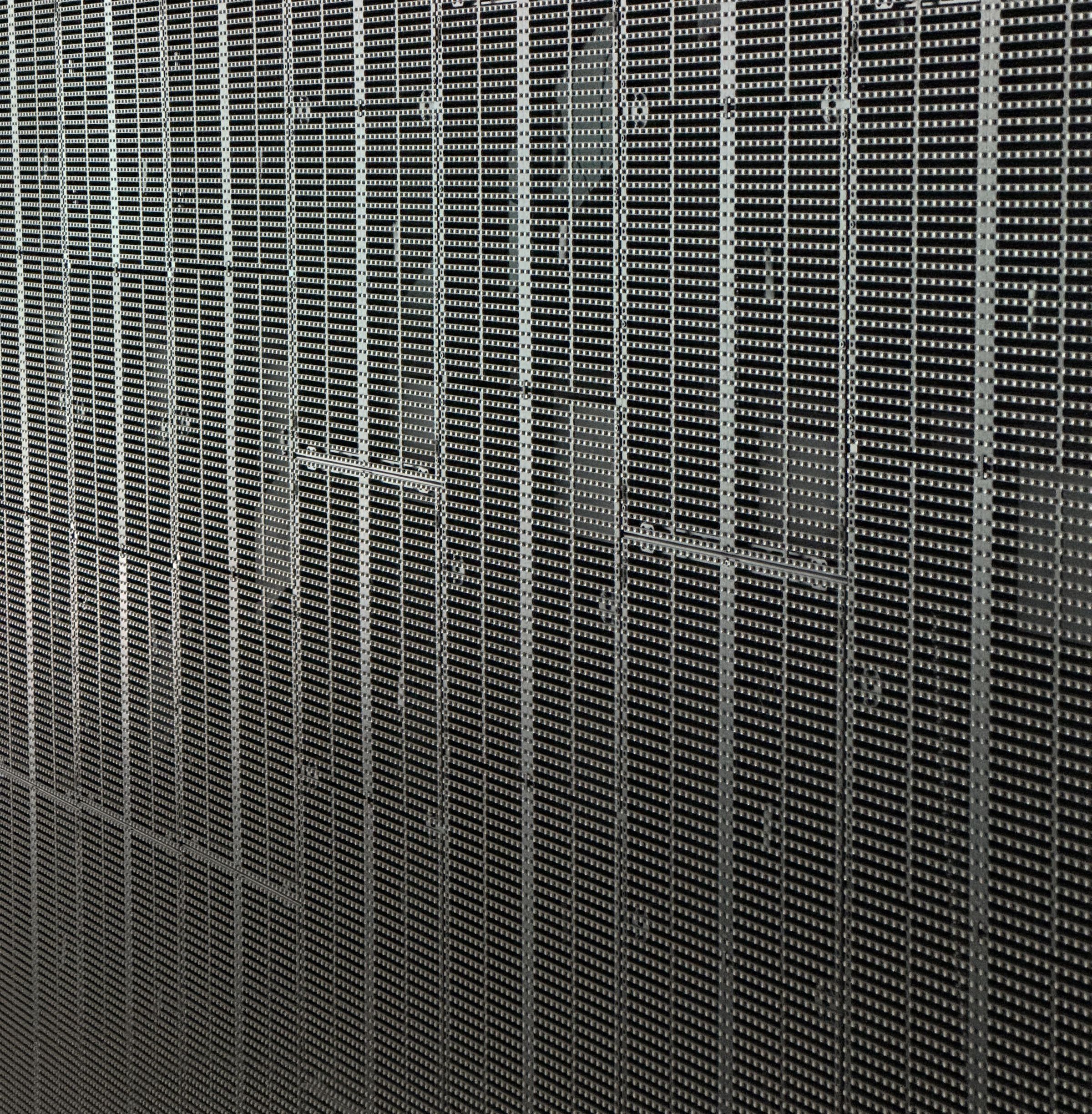 A close-up photo of the Sphere’s display, rows and columns of tiny lights on a see-through mesh.