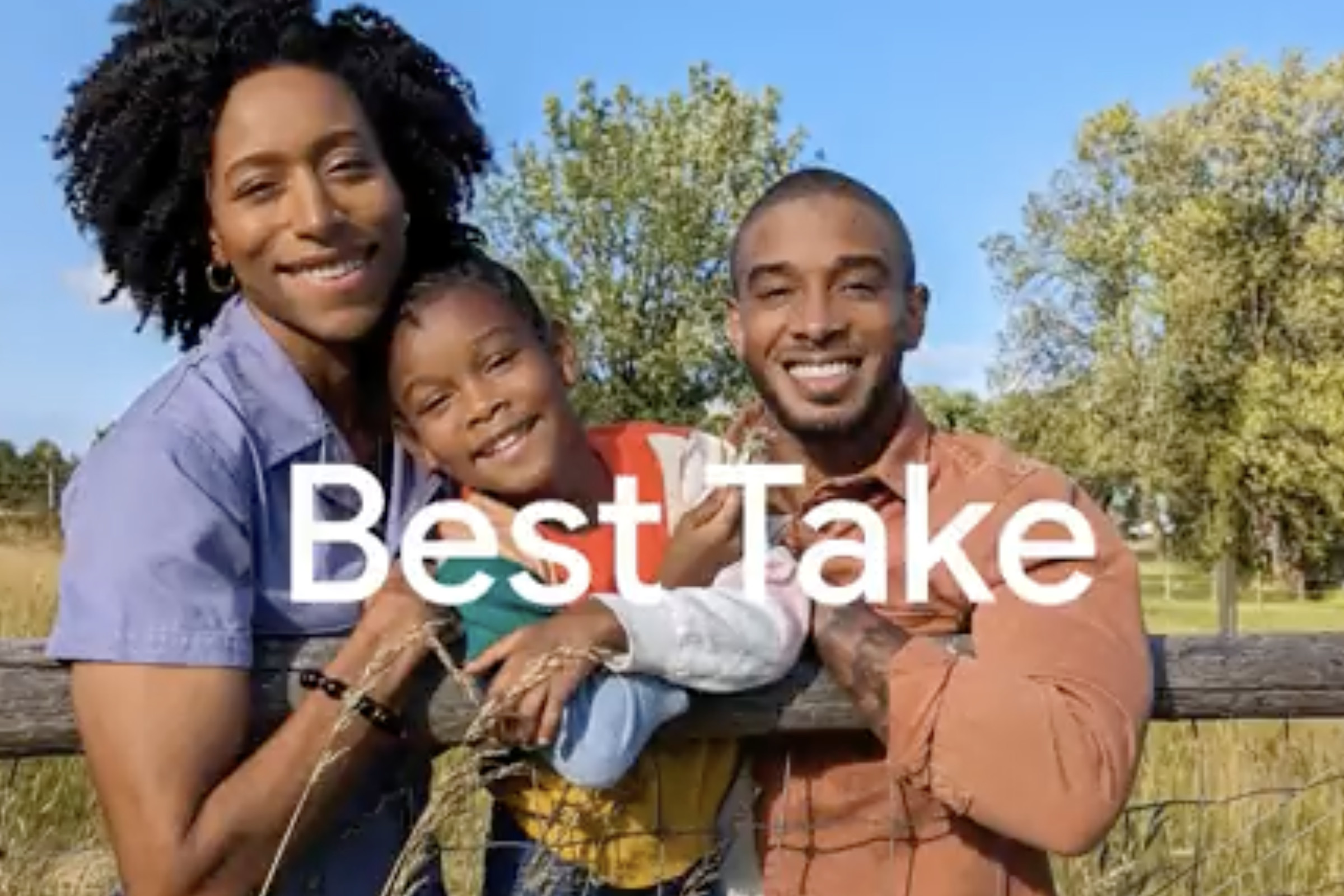 A screenshot of two adults holding a child, all smiling, with the words “Best Take” overlaid on the image.
