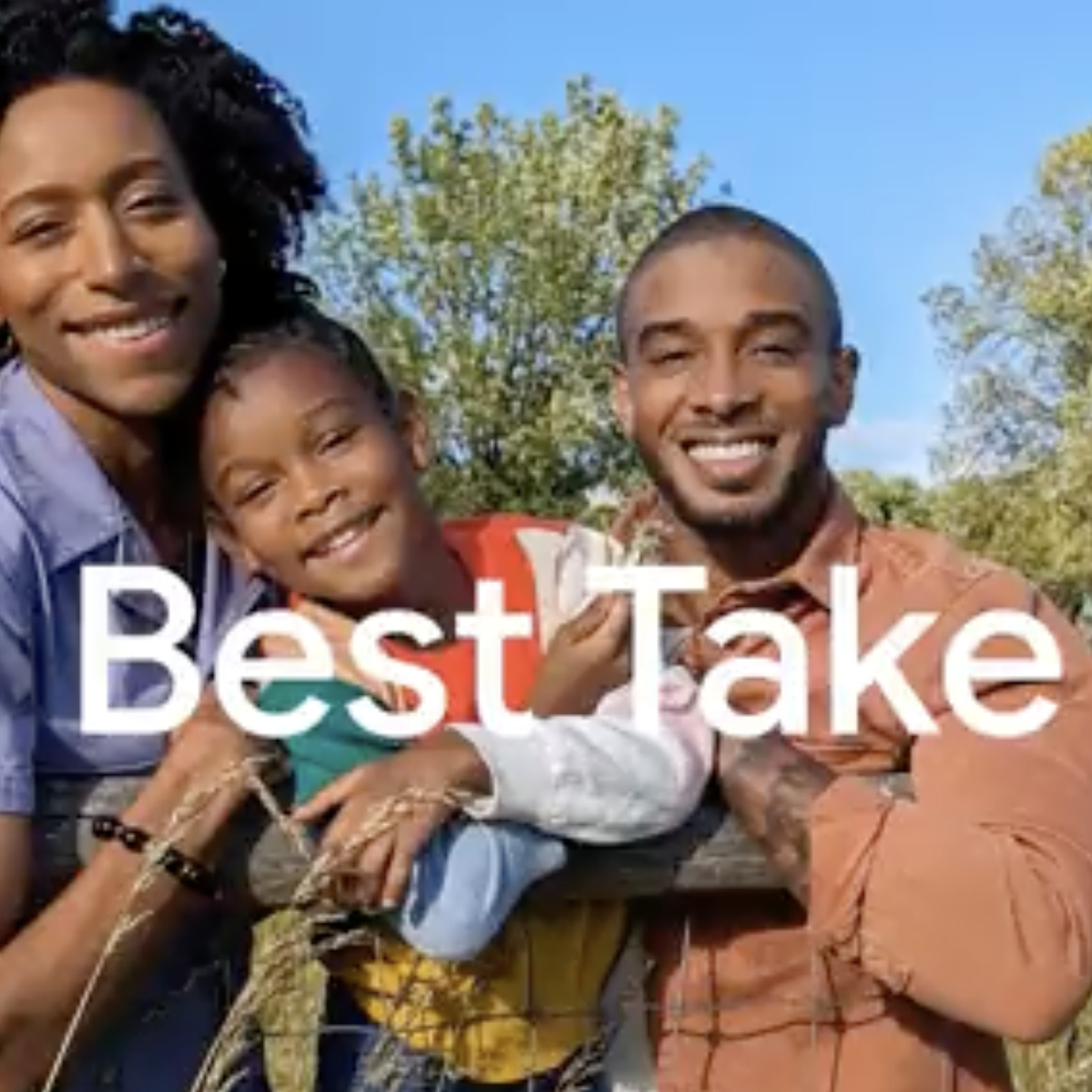 A screenshot of two adults holding a child, all smiling, with the words “Best Take” overlaid on the image.
