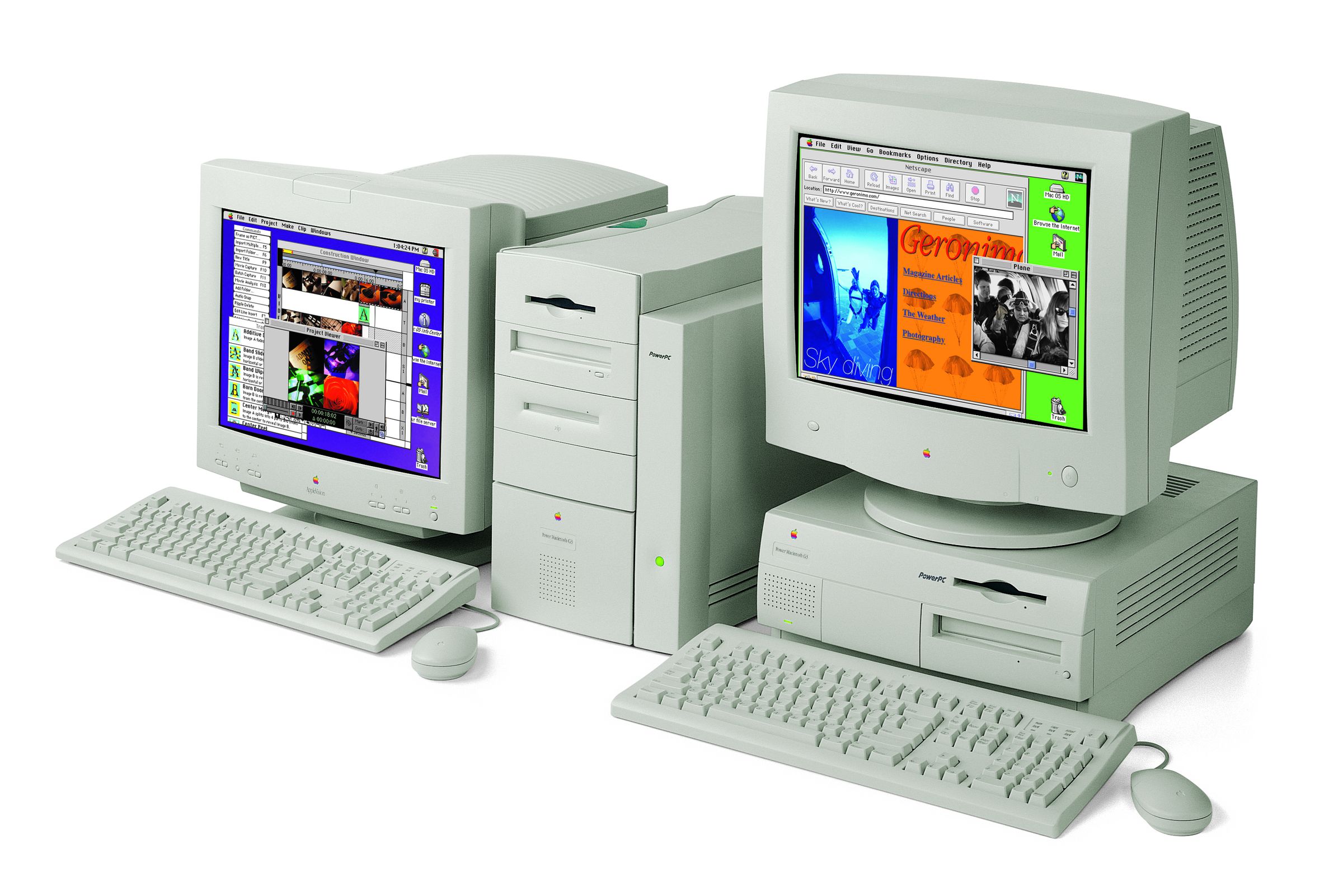 Power Macintosh G3 beige desktops, one a tower, one a pedestal computer, with big CRT monitors.