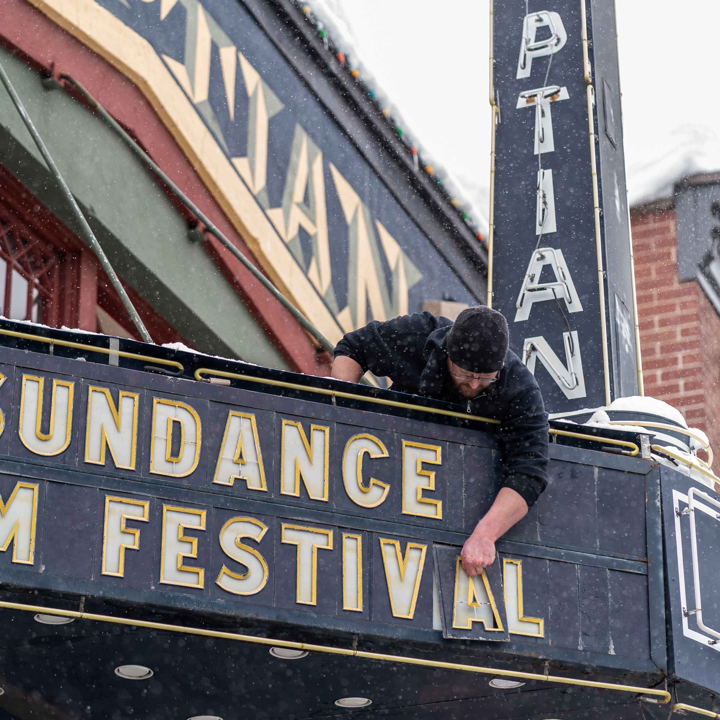 Worker prepares the Egyptian Theater marquee for the 2023 Sundance Film Festival on January 17, 2023 in Park City, Utah.