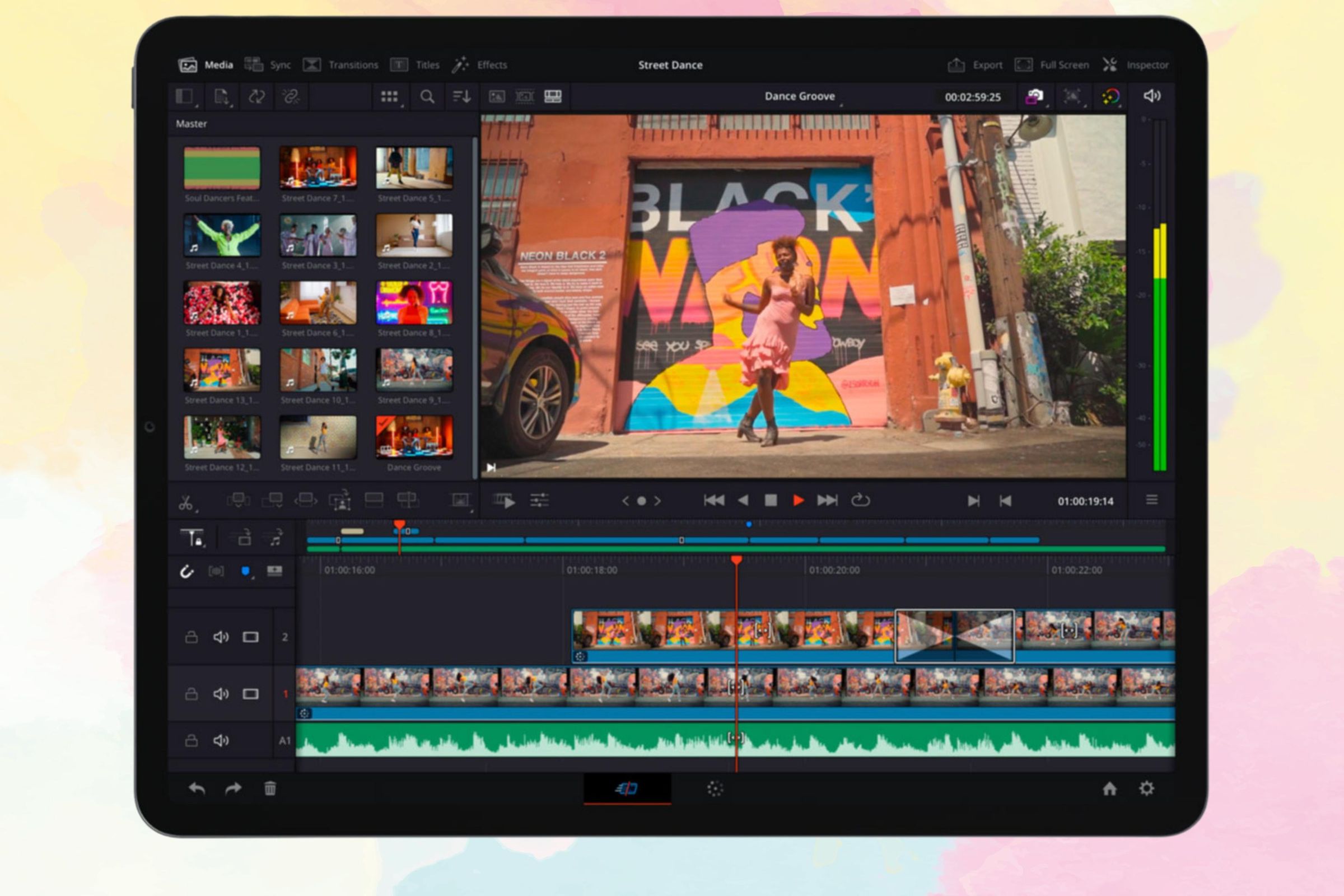 DaVinci Resolve running on an iPad Pro against a colorful pastel backdrop.