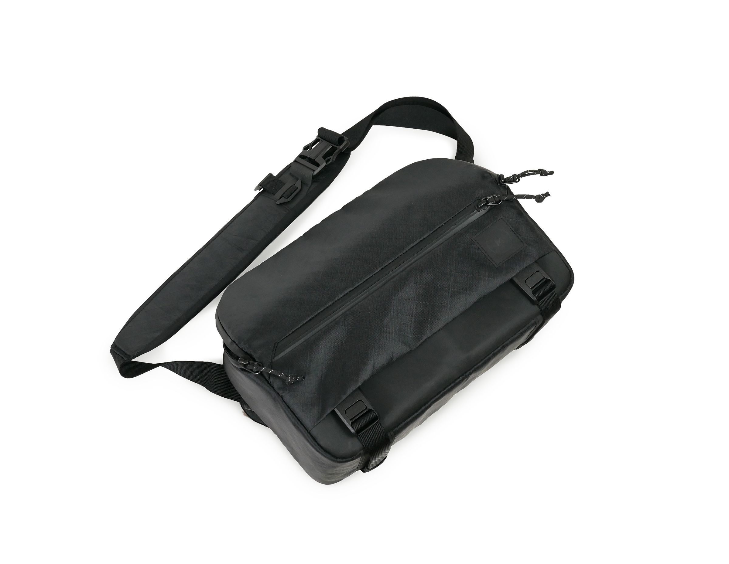 A black 10-liter Moment Rugged Sling bag on a white background