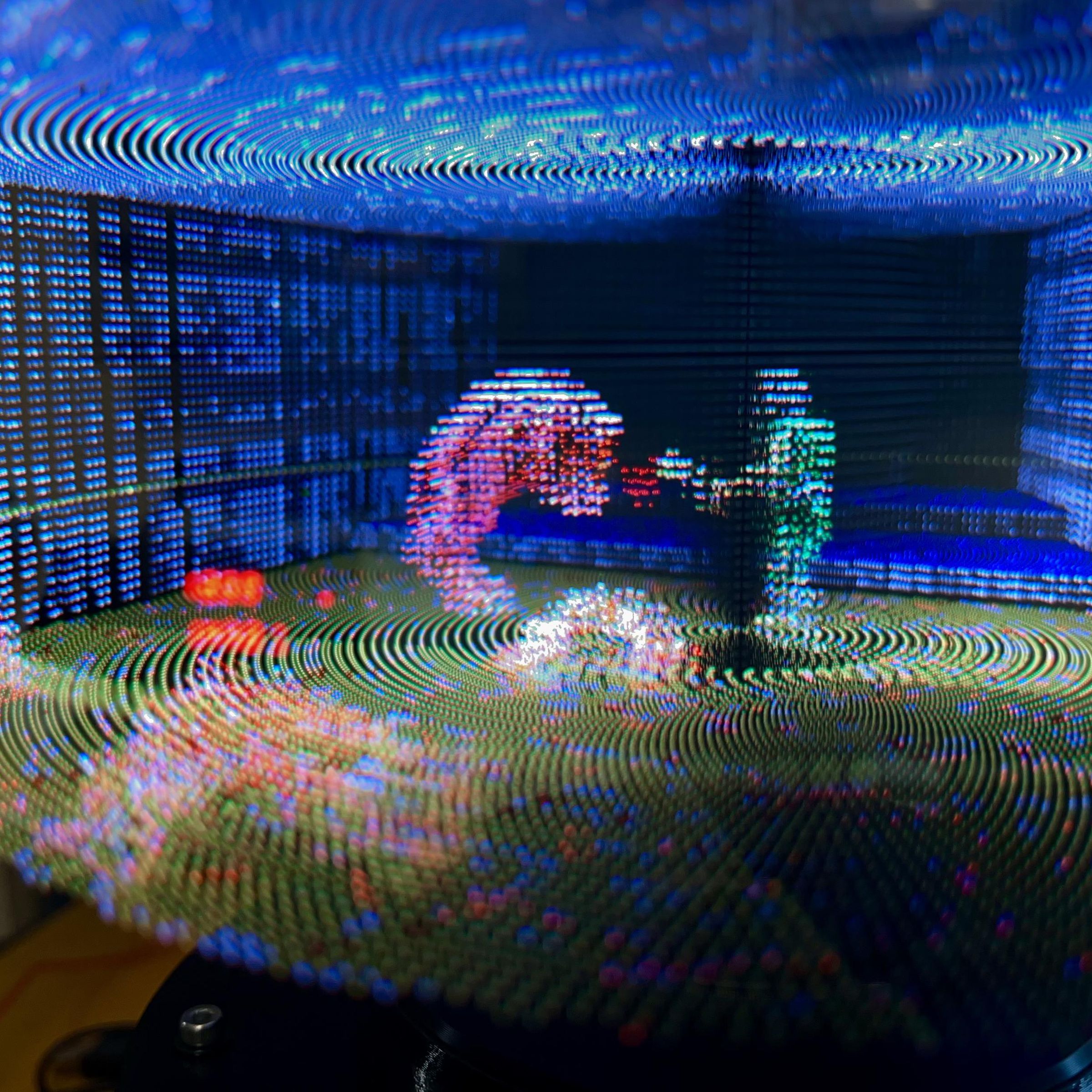 A still image of Doom on a volumetric display.