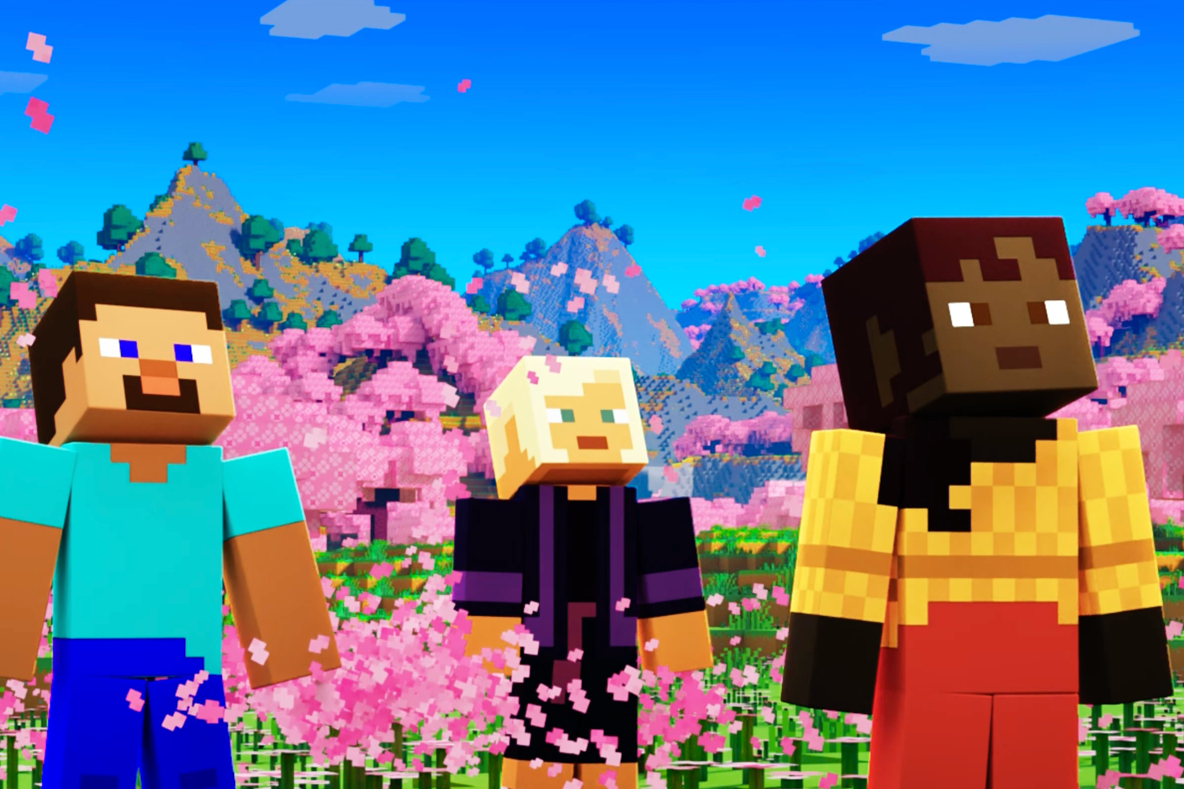 Image from Minecraft Live 2023 featuring three Minecraft characters standing in a field of flowers looking up at the sky.